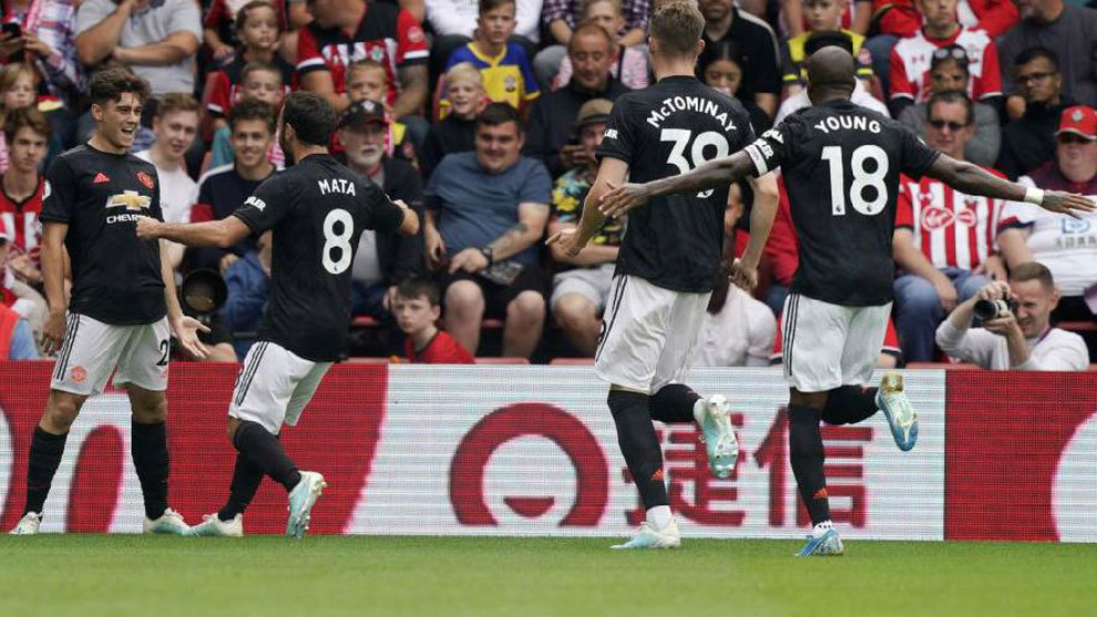 Daniel James and the Manchester United players celebrate after opening...