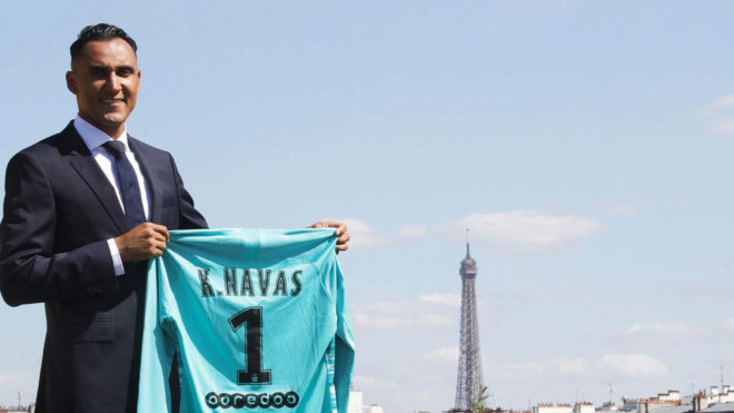 Keylor Navas posing with Paris Saint-Germain&apos;s shirt in from of the...