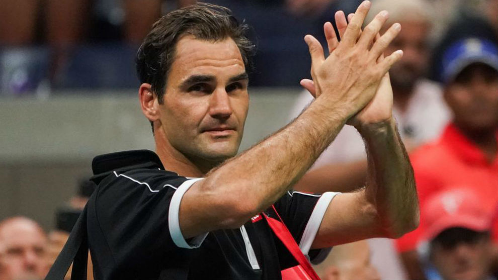 Federer aplaude a la grada de la Arthur Ashe