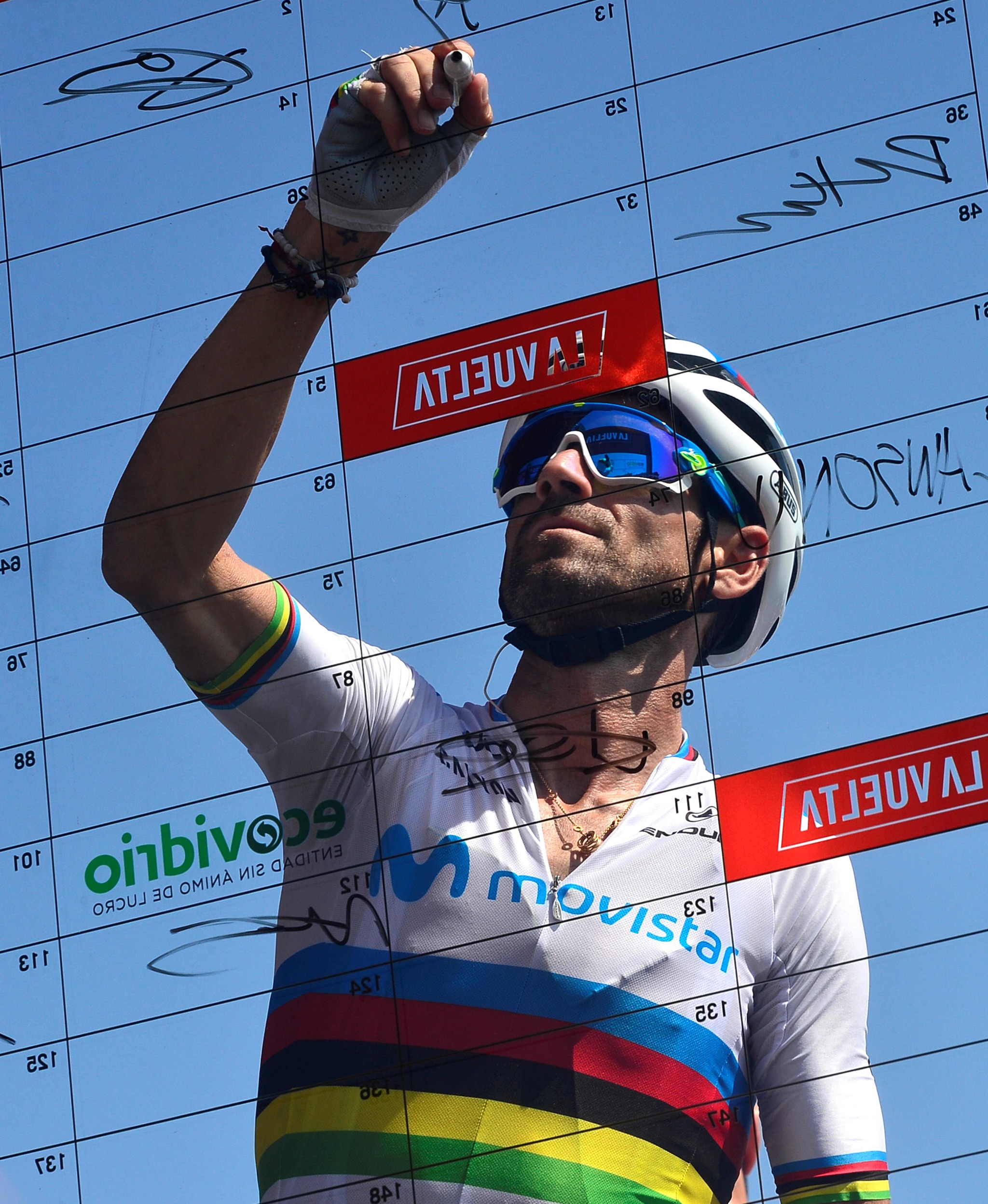 Team Movistar rider Spains <HIT>Alejandro</HIT><HIT>Valverde</HIT> signs a board before the eighth stage of the 2019 La Vuelta cycling tour of Spain, a 166,9 km race from Valls to Igualada on August 31, 2019 in Igualada. (Photo by JOSE JORDAN / AFP)