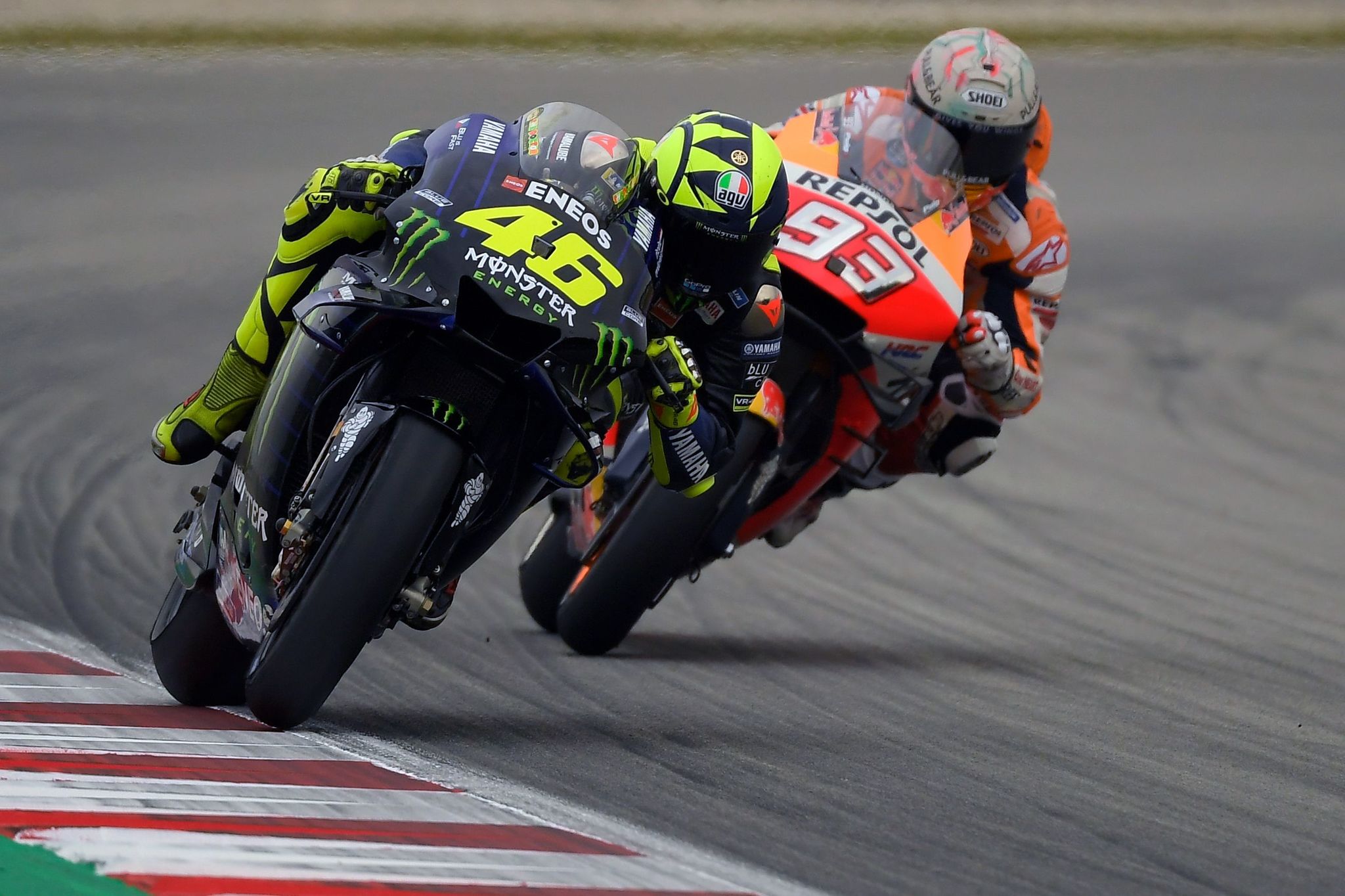Monster Energy Yamahas Italian rider Valentino <HIT>Rossi</HIT> (L) and Repsol Honda Teams Spanish rider Marc <HIT>Marquez</HIT> ride during the Catalunya MotoGP Grand Prix first free practice session at the Catalunya racetrack in Montmelo, near Barcelona, on June 14, 2019. (Photo by LLUIS GENE / AFP)