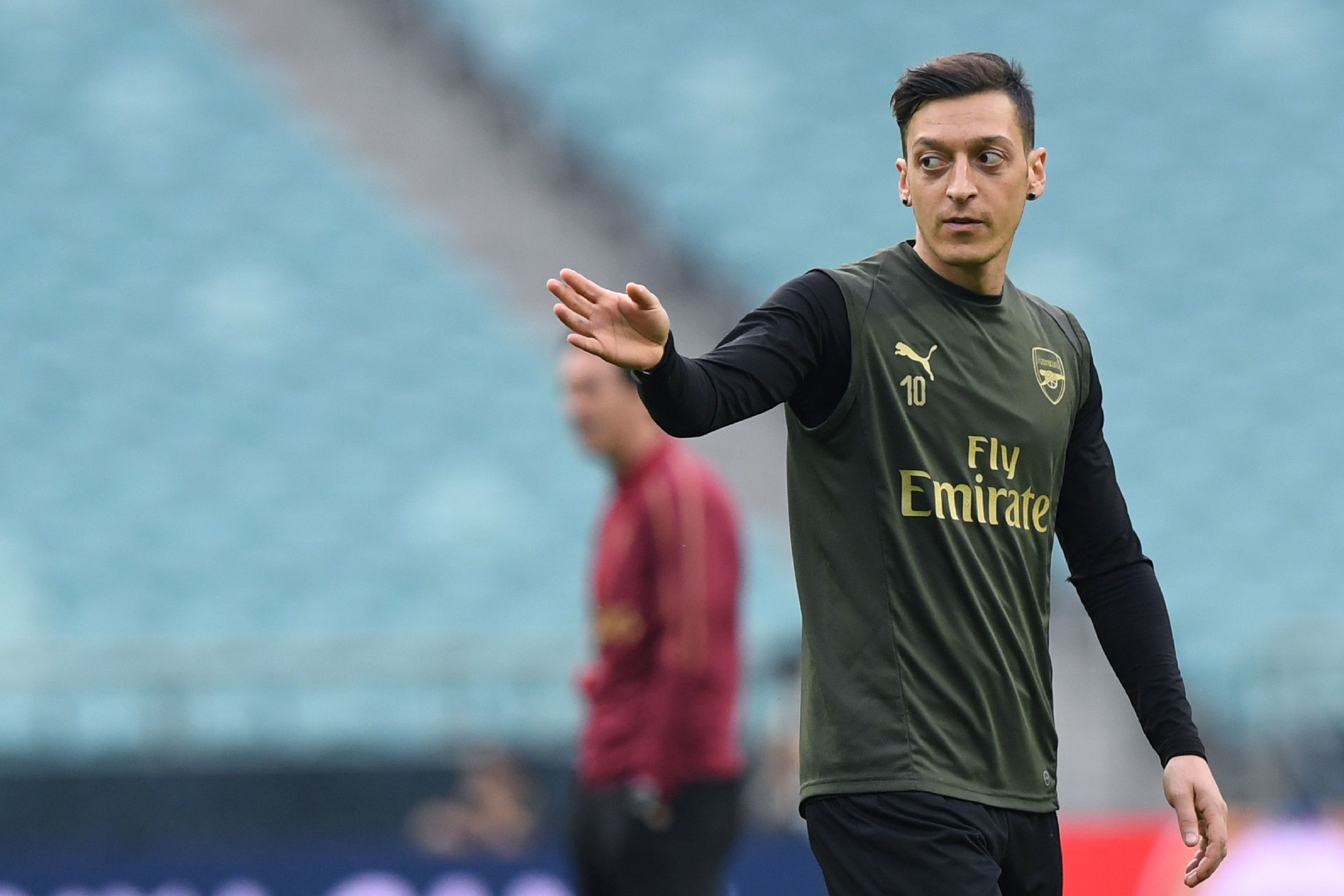 (FILES) In this file photo taken on May 28, 2019 Arsenals German midfielder Mesut <HIT>Ozil</HIT> attends a training session at the Baku Olympic Stadium in Baku on the eve of the UEFA Europa League final football match between Chelsea and Arsenal. - Arsenal footballers Sead Kolasinac and Mesut <HIT>Ozil</HIT> fought off knife-wielding car-jackers in a terrifying ordeal in London captured on video circulated on social media on July 25, 2019. (Photo by Kirill KUDRYAVTSEV / AFP)