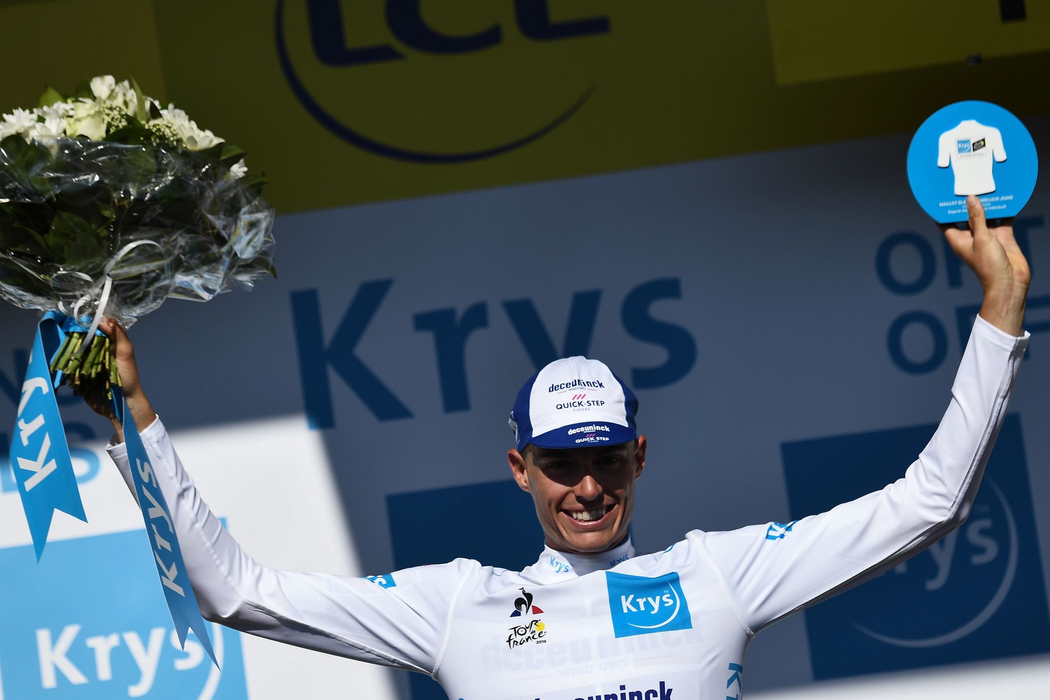 Spains <HIT>Enric</HIT><HIT>Mas</HIT> celebrates his best youngs white jersey on the podium of the thirteenth stage of the 106th edition of the Tour de France cycling race, a 27,2-kilometer individual time-trial in Pau, on July 19, 2019. (Photo by Anne-Christine POUJOULAT / AFP)