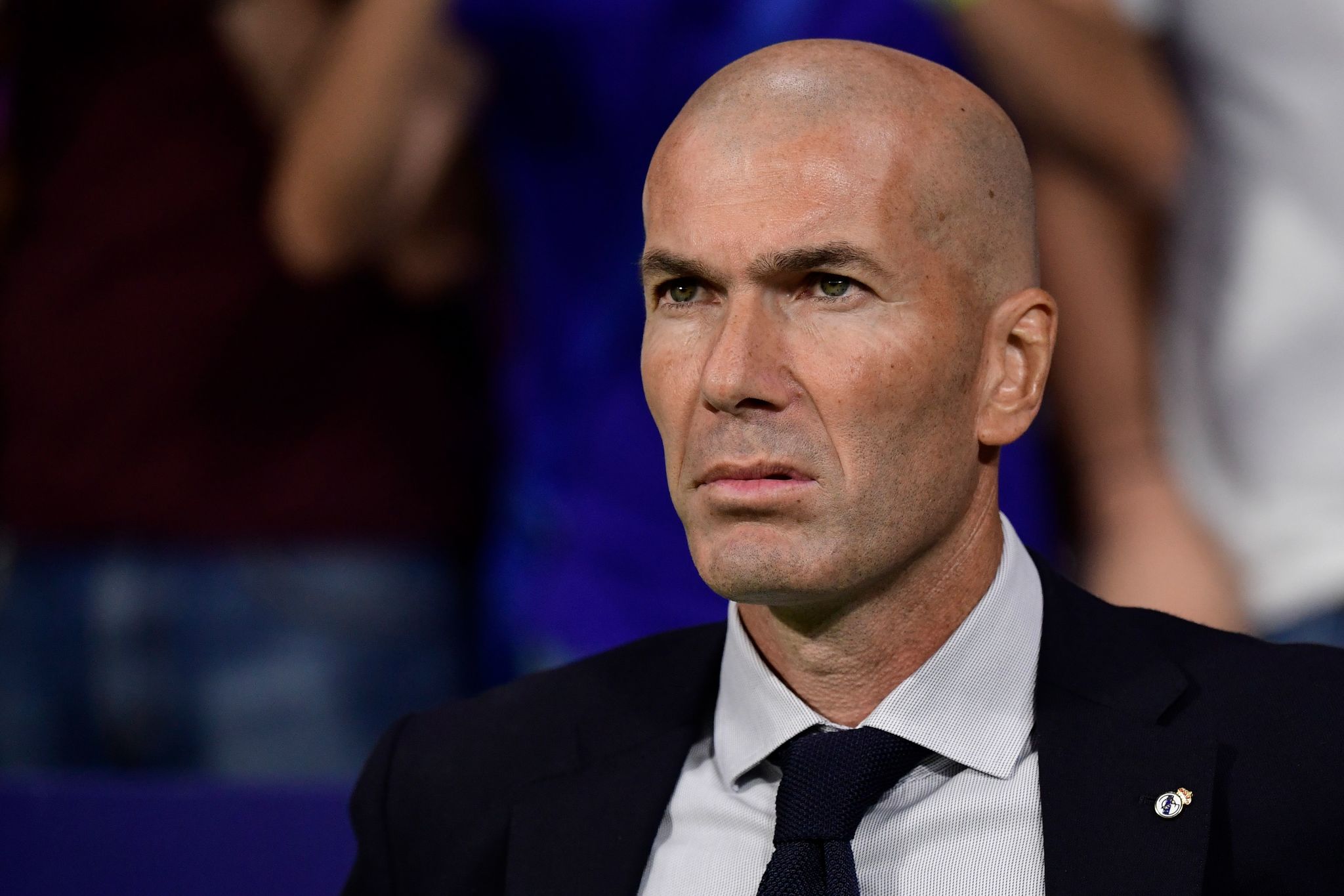 Real Madrids French coach Zinedine <HIT>Zidane</HIT> looks on before the Spanish league football match between Club Atletico de Madrid and Real Madrid CF at the Wanda Metropolitano stadium in Madrid on September 28, 2019. (Photo by JAVIER SORIANO / AFP)