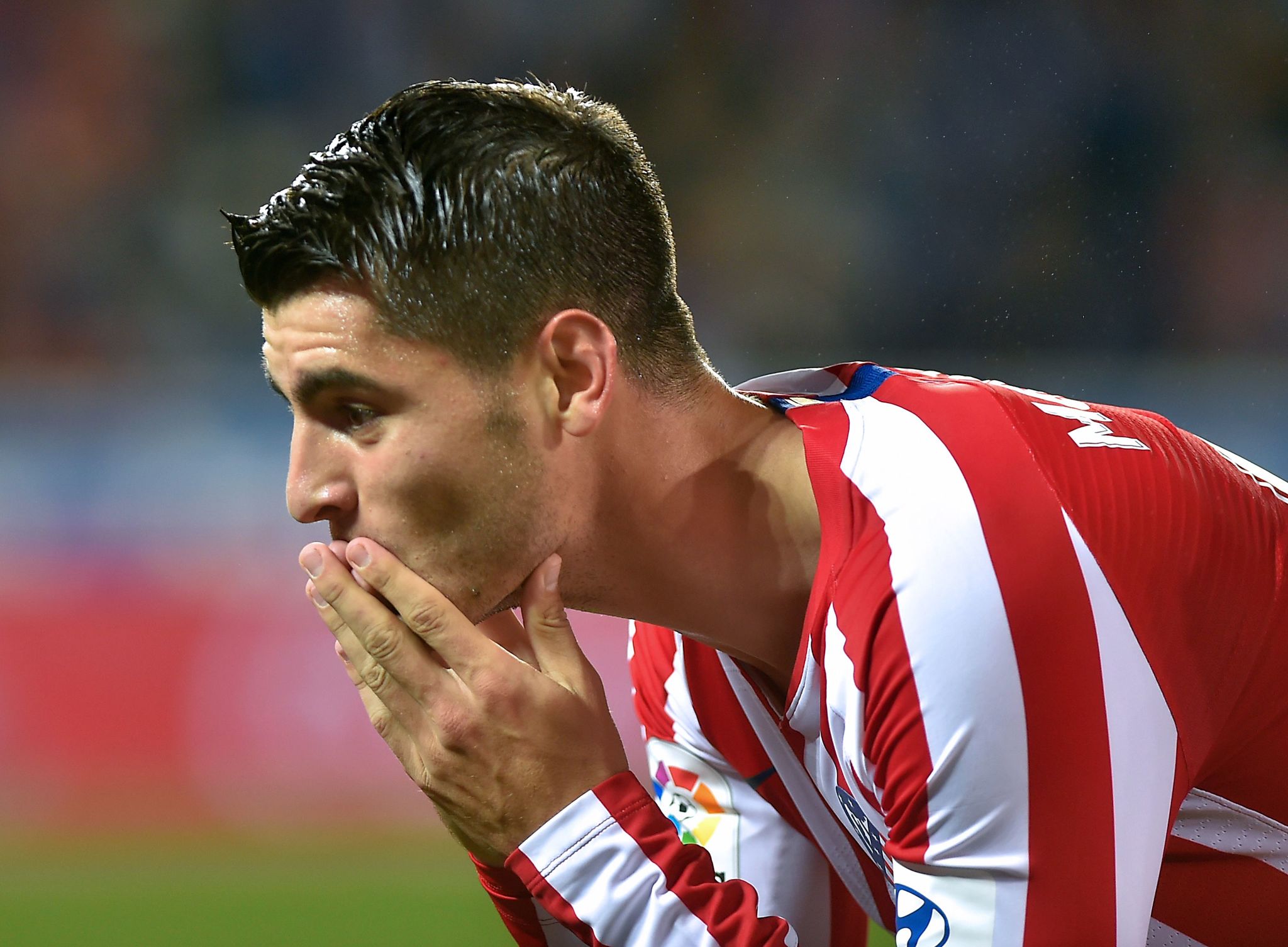 Atletico Madrids Spanish forward Alvaro <HIT>Morata</HIT> celebrates after scoring a goal during the Spanish league football match between Deportivo Alaves and Club Atletico de Madrid at the Mendizorroza stadium in Vitoria on October 29, 2019. (Photo by ANDER GILLENEA / AFP)