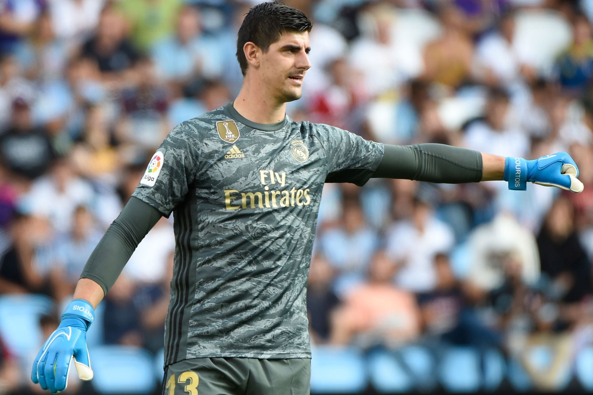 Real Madrids Belgian goalkeeper Thibaut <HIT>Courtois</HIT> gestures during the Spanish League football match between Celta Vigo and Real Madrid at the Balaidos Stadium in Vigo on August 17, 2019. (Photo by MIGUEL RIOPA / AFP)