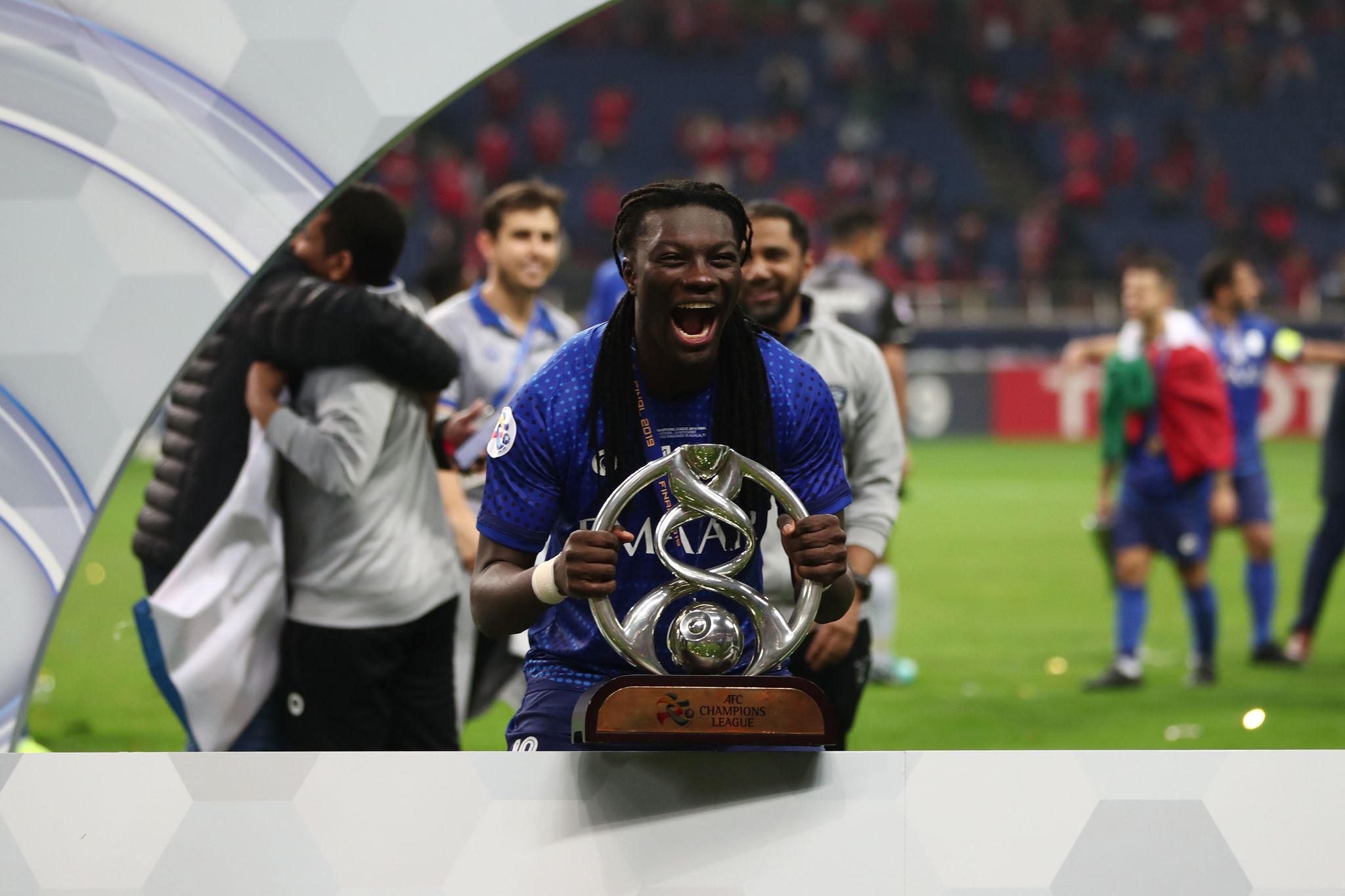 Al-Hilals Bafetimbi <HIT>Gomis</HIT> celebrates with the trophy after their 2-0 victory and Asian club title at the end of the second leg of the AFC Champions League final football match between Japans Urawa Red Diamonds and Saudi's Al-Hilal in Saitama on November 24, 2019. (Photo by Behrouz MEHRI / AFP)