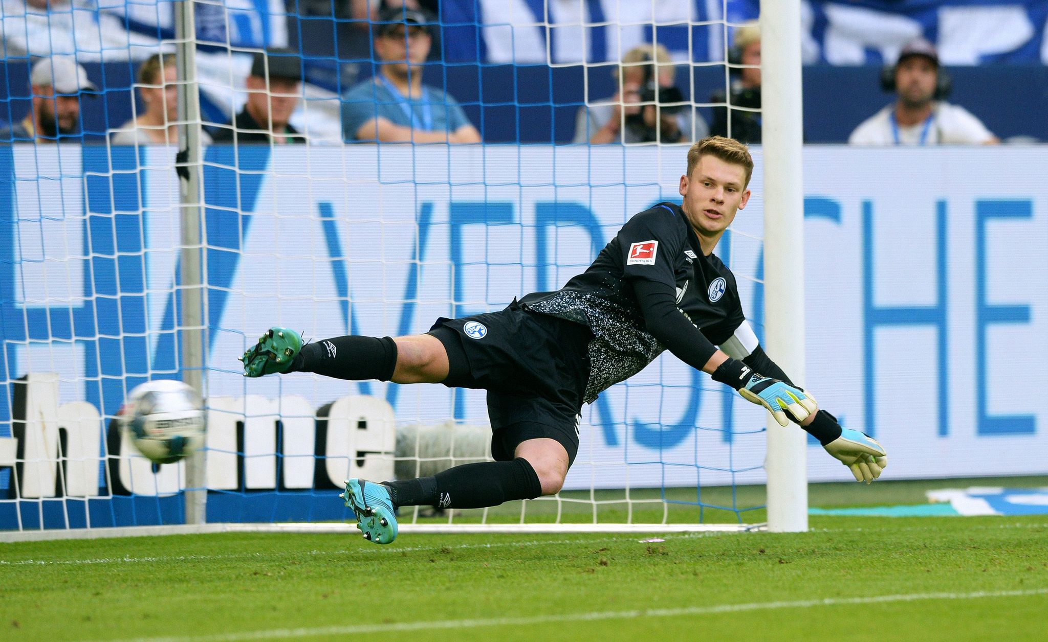(FILES) In this file photo taken on August 24, 2019 Schalkes German goalkeeper Alexander Nuebel fails to save Bayern Munichs Polish forward Robert Lewandowskis penalty during the German first division Bundesliga football match FC Schalke 04 FC Bayern Munich in Gelsenkirchen, western Germany. - Goalkeeper Alexander Nuebel has agreed to join Bayern Munich on a free transfer becoming he latest potential successor to Manuel <HIT>Neuer</HIT>, the club announced on January 04, 2020. (Photo by UWE KRAFT / AFP) / RESTRICTIONS: DFL REGULATIONS PROHIBIT ANY USE OF PHOTOGRAPHS AS IMAGE SEQUENCES AND/OR QUASI-VIDEO