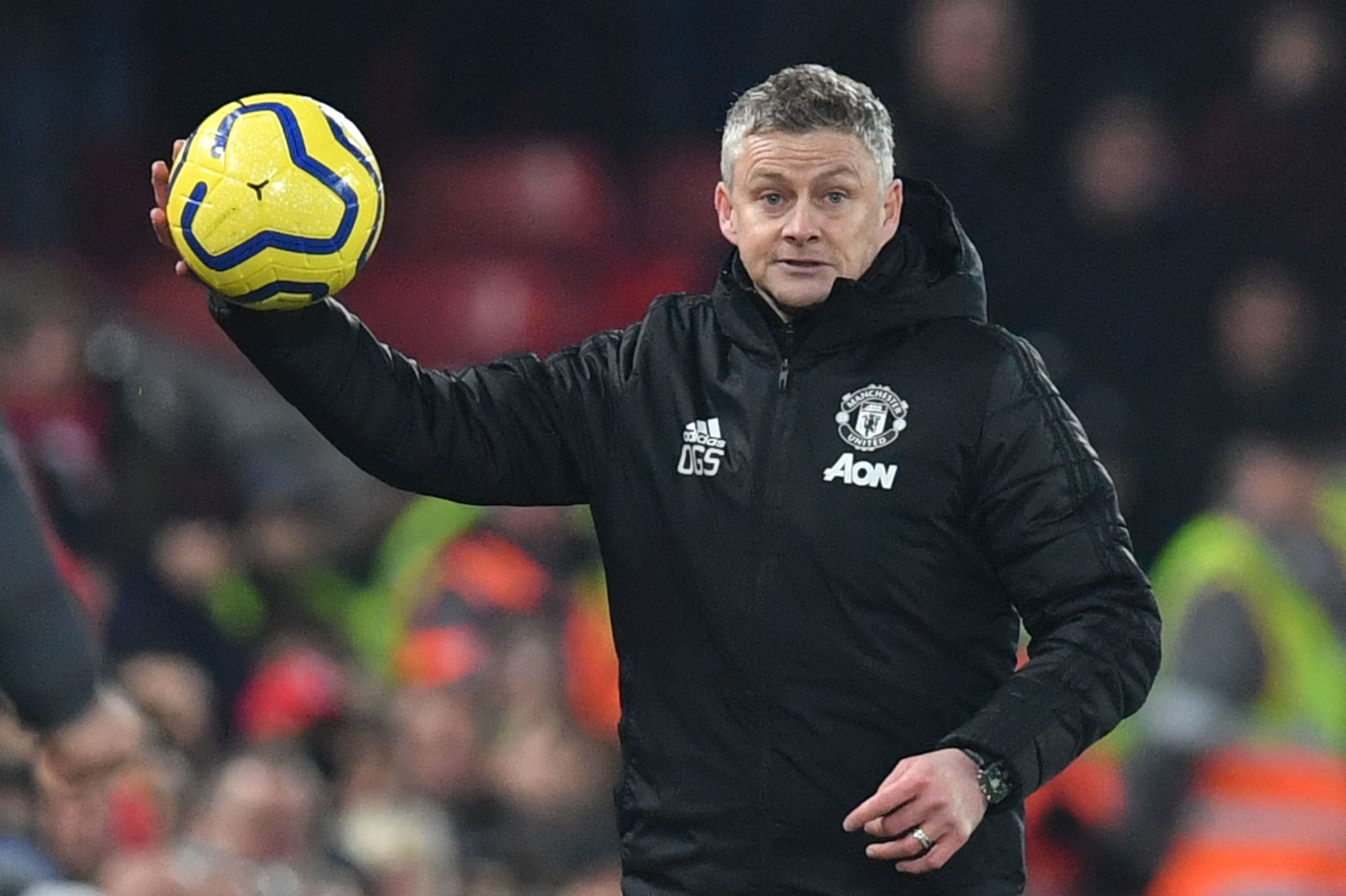 Manchester Uniteds Norwegian manager Ole Gunnar <HIT>Solskjaer</HIT> throws the ball back in from the touchline during the English Premier League football match between Liverpool and Manchester United at Anfield stadium in Liverpool, north west England on January 19, 2020. (Photo by Paul ELLIS / AFP) / RESTRICTED TO EDITORIAL USE. No use with unauthorized audio, video, data, fixture lists, club/league logos or live services. Online in-match use limited to 120 images. An additional 40 images may be used in extra time. No video emulation. Social media in-match use limited to 120 images. An additional 40 images may be used in extra time. No use in betting publications, games or single club/league/player publications. /