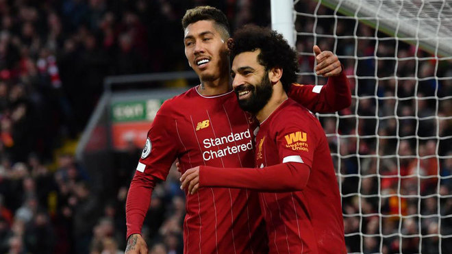 Salah y Firmino celebran uno de los goles al Southampton.