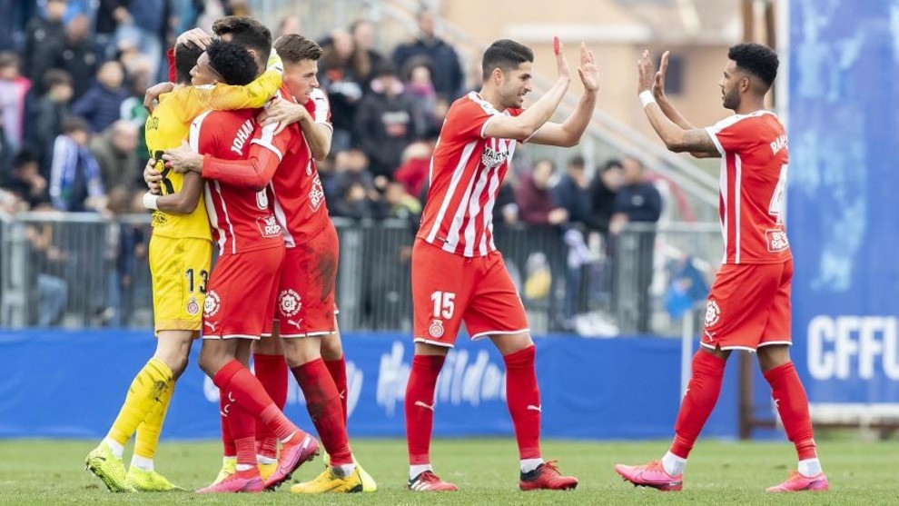 Los jugadores del Girona celebran el triunfo ante el Fuenlabrada.