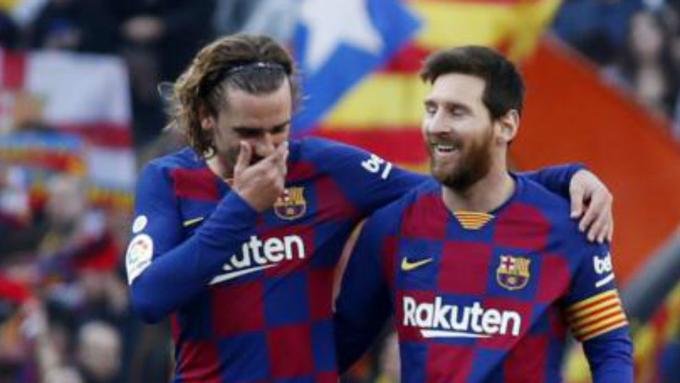 Messi y Griezmann celebran el primero gol.