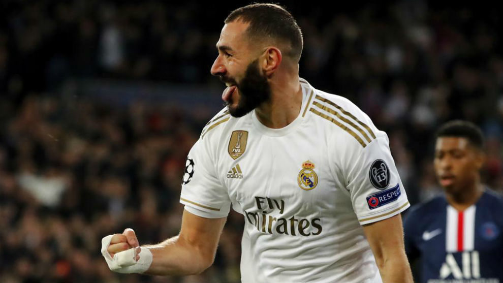 Benzema celebrate scoring against PSG at the Bernabeu earlier in the...