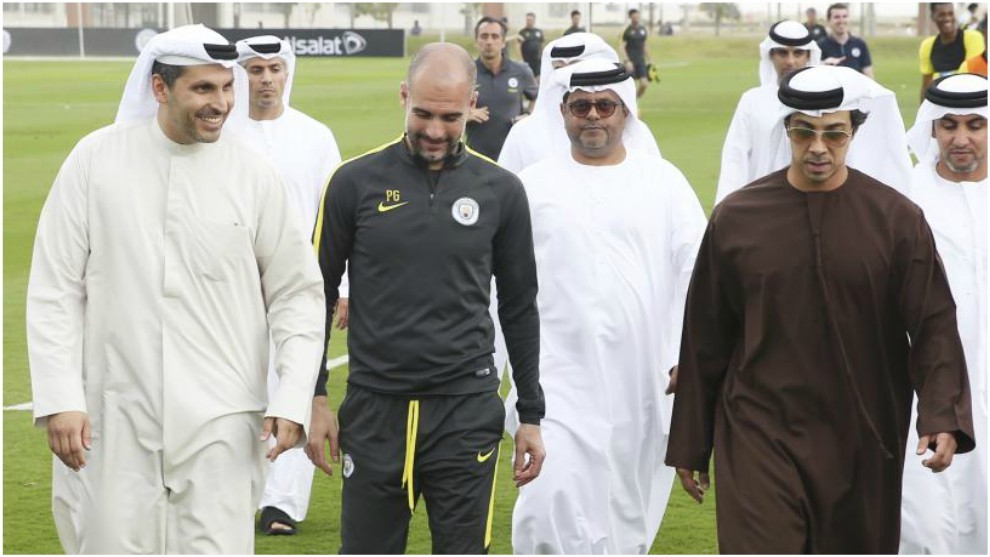 Guardiola with Sheikh Mansour and President Khaldoon Al Mubarak.