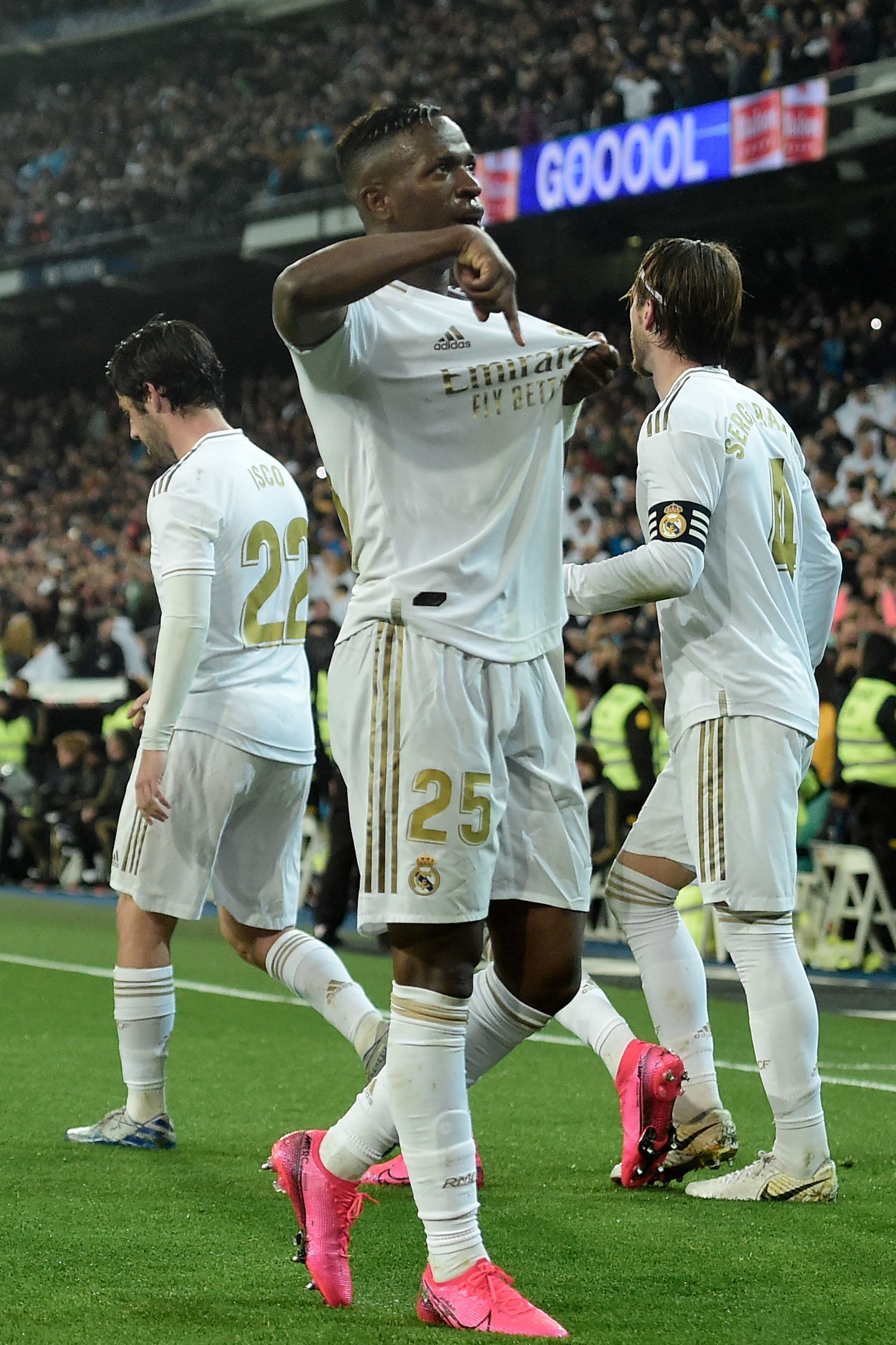 Real Madrids Brazilian forward lt;HIT gt;Vinicius lt;/HIT gt; Junior (C) celebrates after scoring a goal during the Spanish League football match between Real Madrid and Barcelona at the Santiago Bernabeu stadium in Madrid on March 1, 2020. (Photo by OSCAR DEL POZO / AFP)