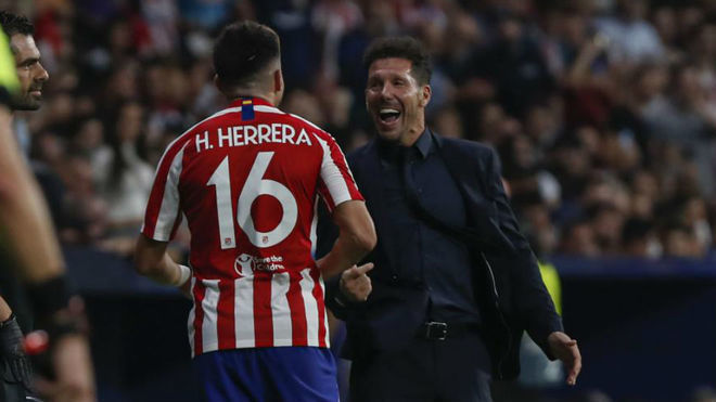 Herrera con Simeone en su gol a la Juve en Champions.