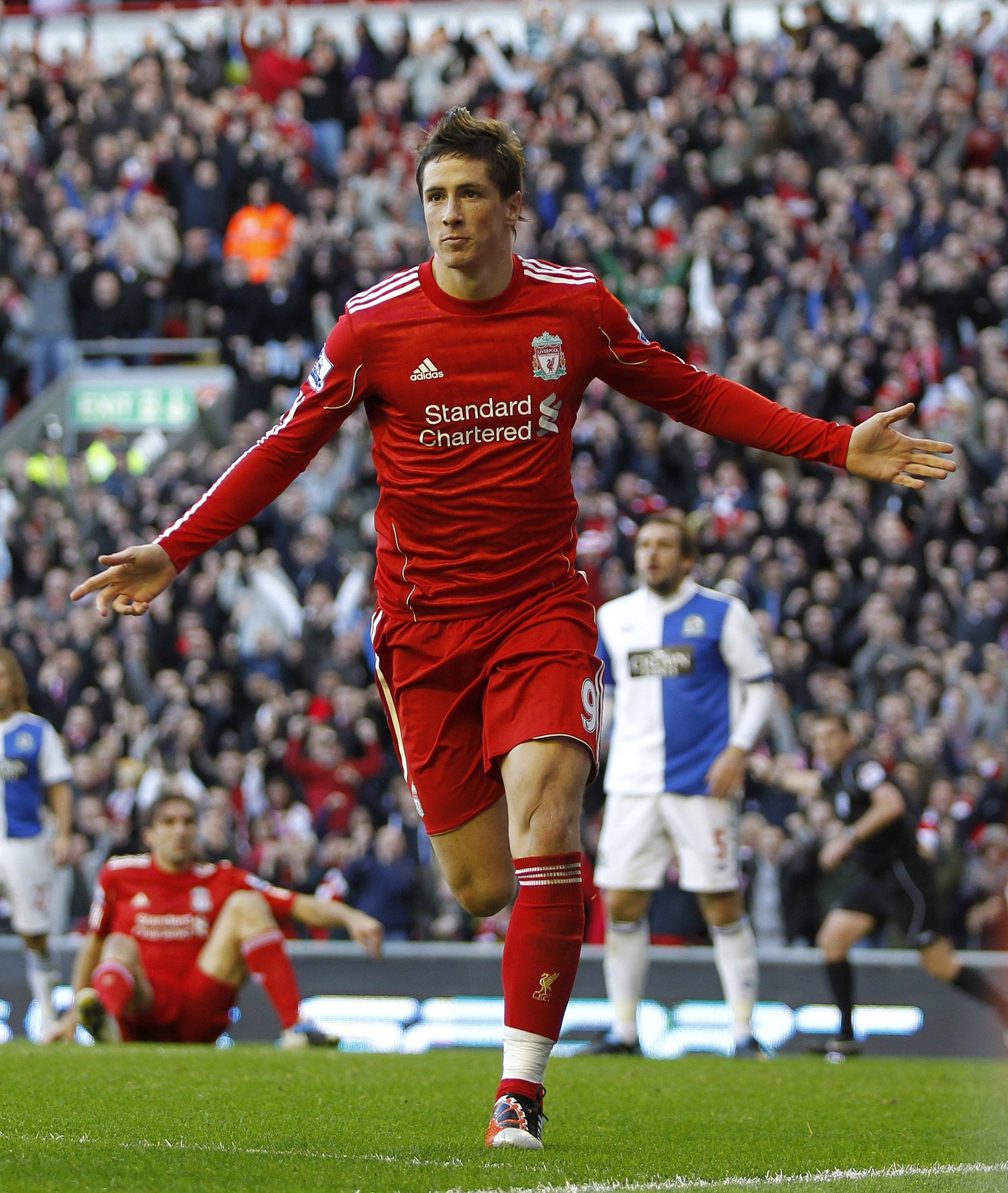  lt;HIT gt;Liverpool lt;/HIT gt;s Spanish player lt;HIT gt;Fernando lt;/HIT gt; lt;HIT gt;Torres lt;/HIT gt; celebrates after scoring his goal against Blackburn Rovers during a Premier League match at Anfield in lt;HIT gt;Liverpool lt;/HIT gt;, England on October 24, 2010. AFP PHOTO/IAN KINGTON FOR EDITORIAL USE ONLY Additional licence required for any commercial/promotional use or use on TV or internet (except identical online version of newspaper) of Premier League/Football League photos. Tel DataCo 44 207 2981656. Do not alter/modify photo