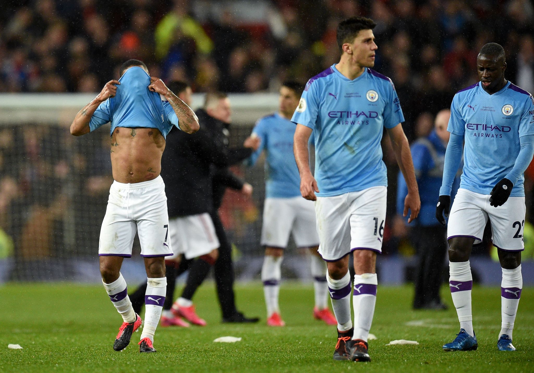  lt;HIT gt;Manchester lt;/HIT gt; lt;HIT gt;City lt;/HIT gt; players react after conceding their second goal during the English Premier League football match between lt;HIT gt;Manchester lt;/HIT gt; United and lt;HIT gt;Manchester lt;/HIT gt; lt;HIT gt;City lt;/HIT gt; at Old Trafford in lt;HIT gt;Manchester lt;/HIT gt;, north west England, on March 8, 2020. (Photo by Oli SCARFF / AFP) / RESTRICTED TO EDITORIAL USE. No use with unauthorized audio, video, data, fixture lists, club/league logos or live services. Online in-match use limited to 120 images. An additional 40 images may be used in extra time. No video emulation. Social media in-match use limited to 120 images. An additional 40 images may be used in extra time. No use in betting publications, games or single club/league/player publications. /