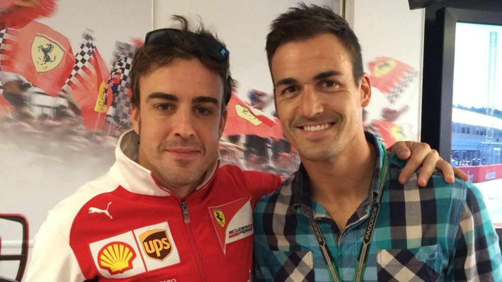 Sordo posa con Alonso en el Gran Premio de Alemania de 2014.