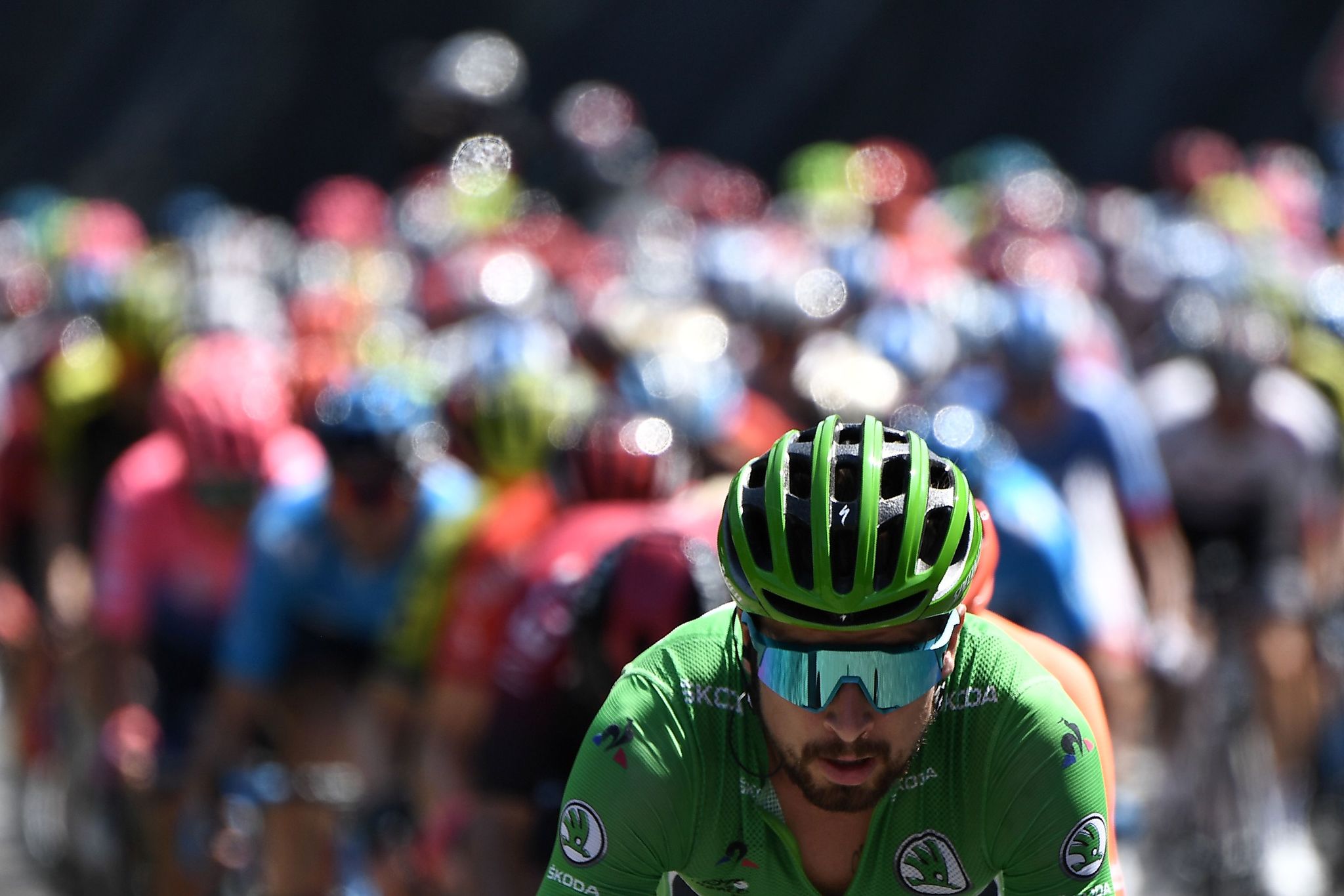 (FILES) In this file photo taken on July 25, 2019 Slovakias lt;HIT gt;Peter lt;/HIT gt; lt;HIT gt;Sagan lt;/HIT gt;, wearing the best sprinters green jersey leads the race during the eighteenth stage of the 106th edition of the Tour de France cycling race between Embrun and Valloire, in Valloire. - The Tour de France is not only a French monument, but also the economic heartbeat of professional cycling itself and analysts fear heavy consequences if the coronavirus crisis forces its cancellation. An announcement is expected this week on either a postponement or an outright cancellation of the 21-day extravaganza that is currently scheduled to start in Nice on June 27. (Photo by JEFF PACHOUD / AFP)