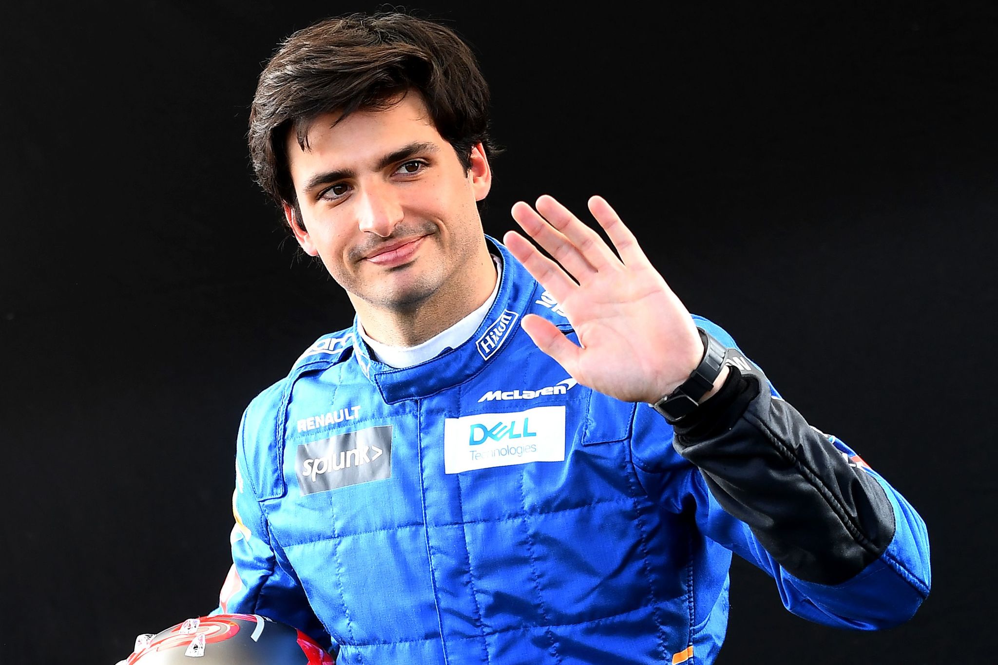 (FILES) In this file photo taken on March 12, 2020 then McLarens Spanish driver lt;HIT gt;Carlos lt;/HIT gt; lt;HIT gt;Sainz lt;/HIT gt; Jr poses for a photo at the Albert Park circuit ahead of the Formula One Australian Grand Prix in Melbourne. - lt;HIT gt;Sainz lt;/HIT gt; is to succeed Vettel at Ferrari F1 team next season, Ferrari officially announced on May 14, 2020. (Photo by William WEST / AFP) / -- IMAGE RESTRICTED TO EDITORIAL USE - STRICTLY NO COMMERCIAL USE --