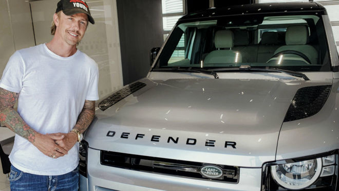 Guti with his new Land Rover Defender 110 SE.