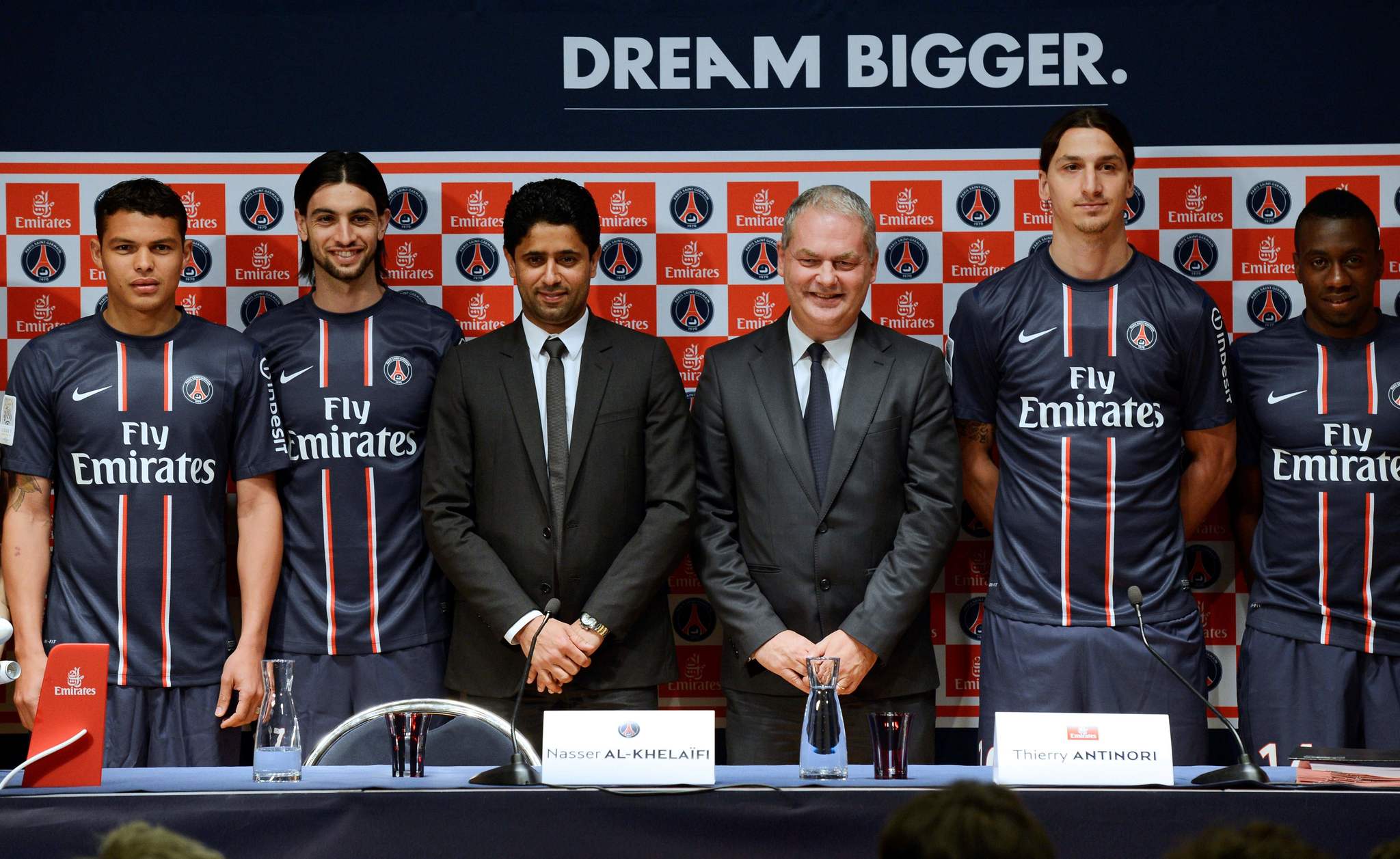 (FILES) In this file photo taken on May 17, 2013 Paris Saint-Germain ( lt;HIT gt;PSG lt;/HIT gt;)s Brazilian defender and captain Thiago Silva, Argentinian midfielder Javier lt;HIT gt;Pastore lt;/HIT gt;, lt;HIT gt;PSG lt;/HIT gt; football clubs chairman Nasser Al-Khelaifi and, Executive Vice President of Emirates company Thierry Antinori, lt;HIT gt;PSG lt;/HIT gt;s Swedish forward Zlatan Ibrahimovi? and French midfielder Blaise Matuidi pose during a press conference at the Parc des Princes stadium in Paris. - With a bling-bling image, repeated crises and outstanding successes: officially born on August 12, 1970 in order to become the "big club" that was missing in Paris, the Paris Saint-Germain will celebrate its fiftieth anniversary on Wednesday, during the UEFA Champions league quarter against Atalanta. (Photo by Bertrand GUAY / AFP)