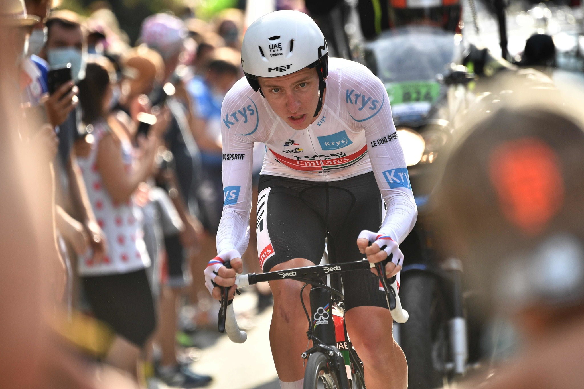 TOPSHOT - Team UAE Emirates rider Slovenia's Tadej lt;HIT gt;Pogacar lt;/HIT gt; wearing the best young's white jersey rides during the 20th stage of the 107th edition of the Tour de France cycling race, a time trial of 36 km between Lure and La Planche des Belles Filles, on September 19, 2020. (Photo by Anne-Christine POUJOULAT / AFP)