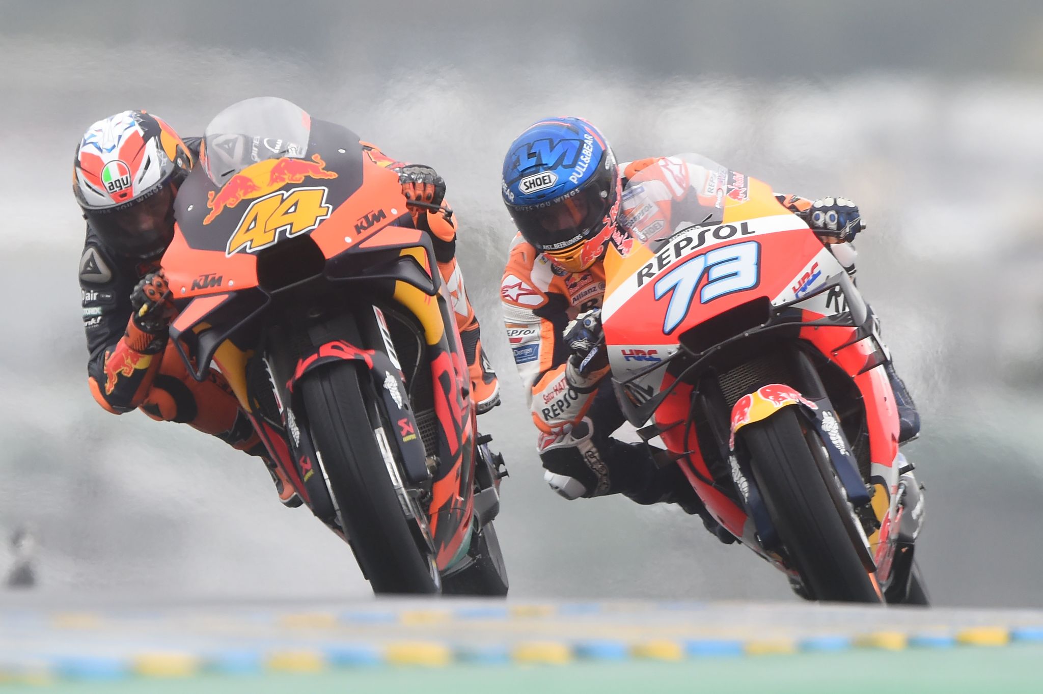 (From L) Red Bull KTM Factory Racing's Spanish rider Pol Espargaro, compete ahead of Repsol Honda Team's Spanish rider lt;HIT gt;Alex lt;/HIT gt; lt;HIT gt;Marquez lt;/HIT gt; during the French MotoGP race in Le Mans northwestern France, on October 11, 2020. (Photo by JEAN-FRANCOIS MONIER / AFP)