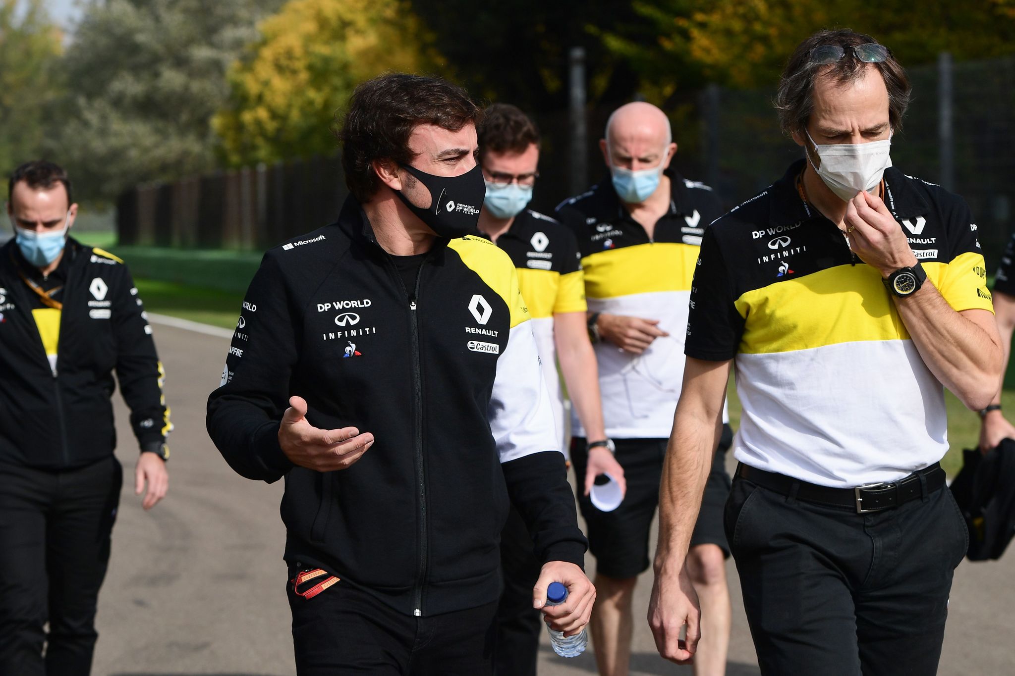 Renault's Spanish driver lt;HIT gt;Fernando lt;/HIT gt; lt;HIT gt;Alonso lt;/HIT gt; (C) inspects the Autodromo Internazionale Enzo e Dino Ferrari race track in Imola, Italy, on October 30, 2020, two days ahead of the Formula One Emilia Romagna Grand Prix. - lt;HIT gt;Fernando lt;/HIT gt; lt;HIT gt;Alonso lt;/HIT gt; will step up his preparations for a return to Formula One next year with a two-day test in Bahrain next week, his Renault team said on October 30. (Photo by Miguel MEDINA / AFP)