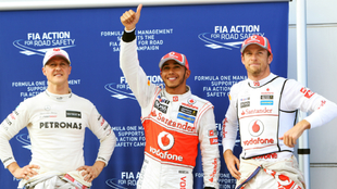 Button, junto a Hamilton y Schumacher.