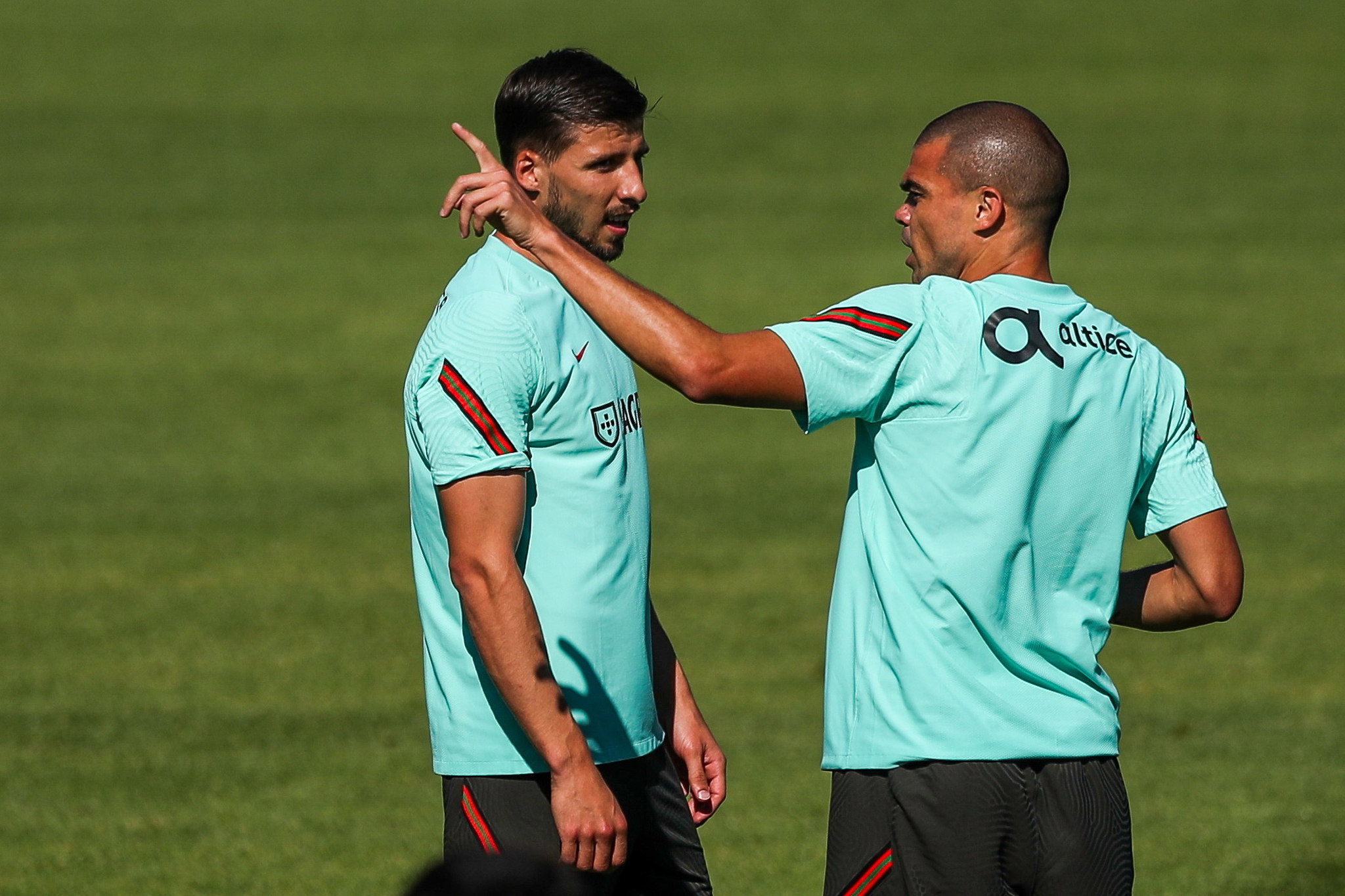Ruben Dias and Pepe have a discussion during one of Portugal's recent training sessions.