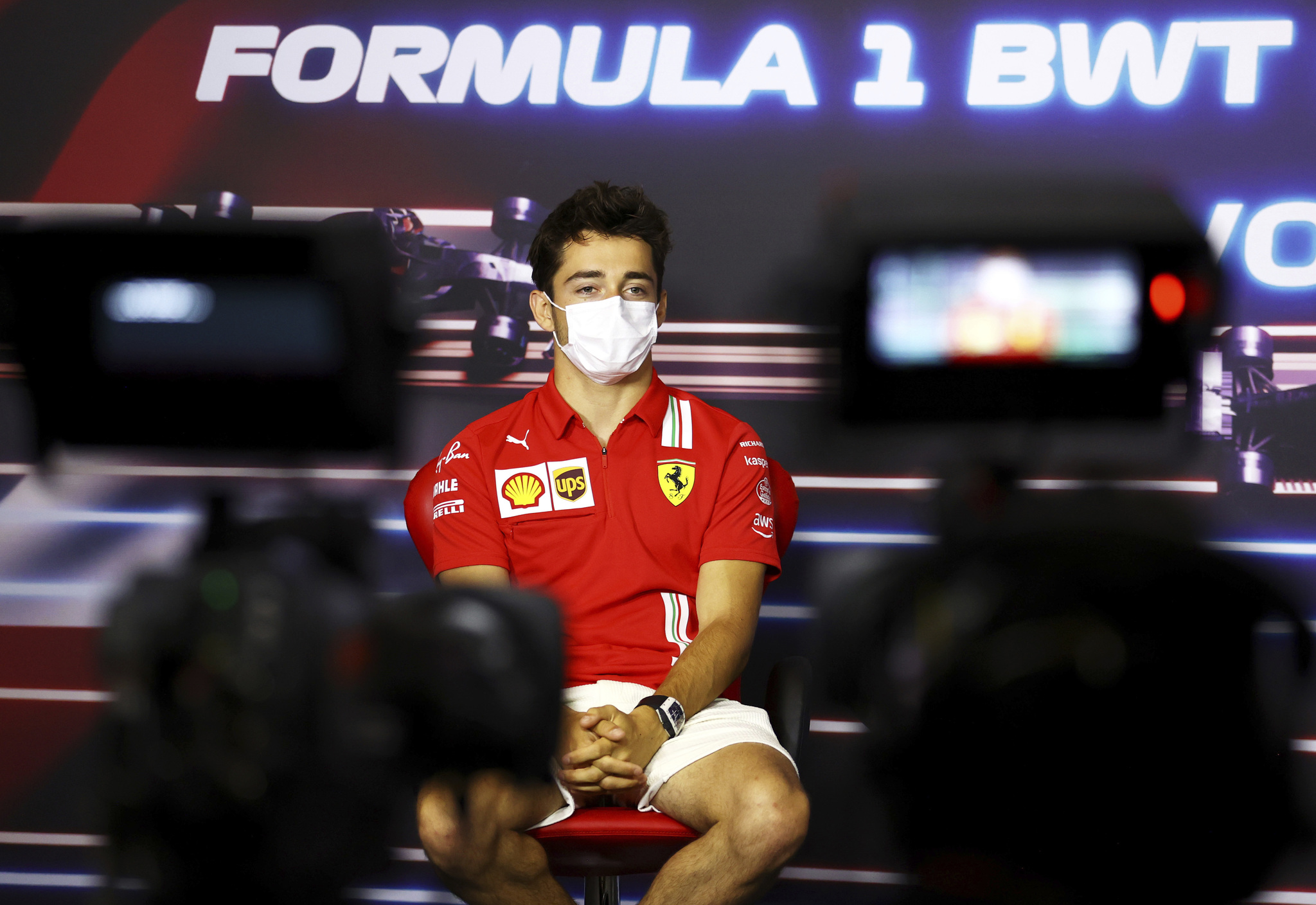 Ferrari driver Charles lt;HIT gt;Leclerc lt;/HIT gt; of Monaco attends a media conference ahead of the Austrian Formula One Grand Prix at the Red Bull Ring racetrack in Spielberg, Austria, Thursday, July 1, 2021. (Bryn Lennon/Pool Photo via AP)