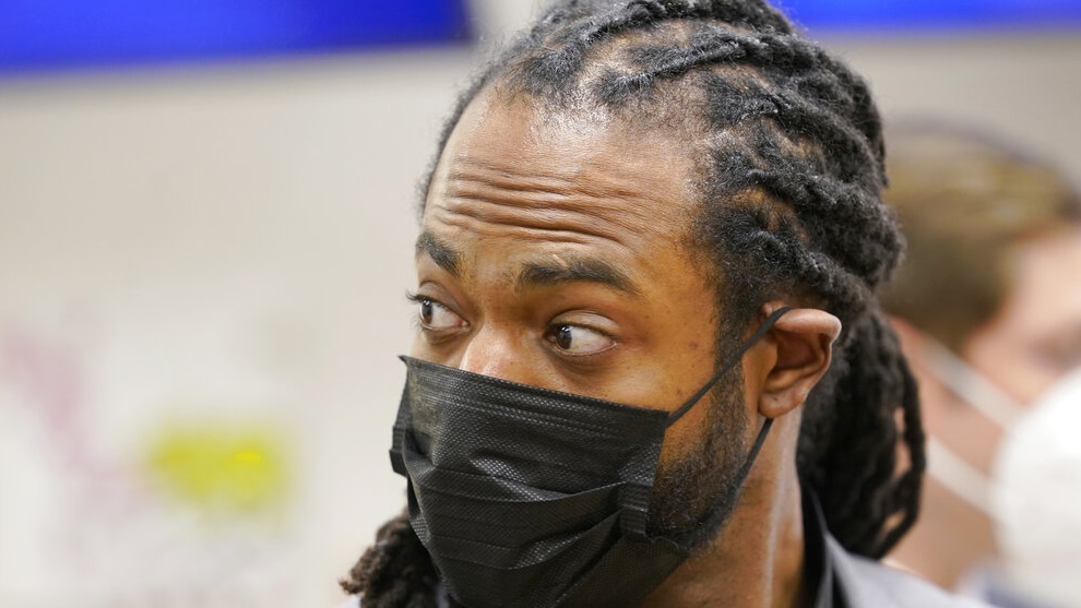 NFL football player Richard Sherman looks back during a hearing at King County District Court.