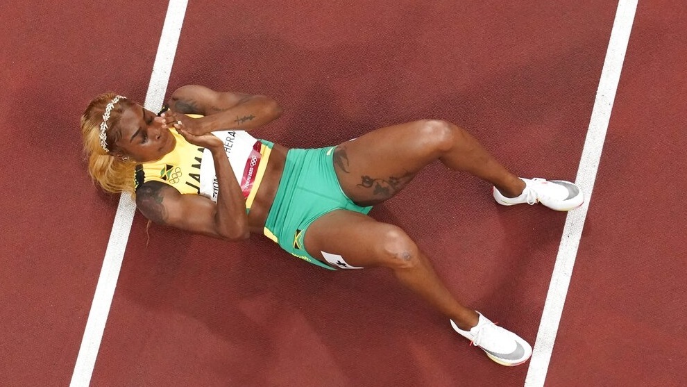 Elaine Thompson-Herah wins the gold during the finals of the women's 100-meter.
