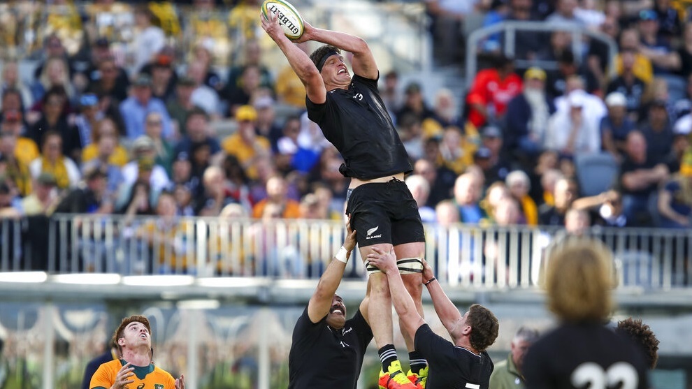 New Zealands Scott Barrett is held aloft to win a lineout.