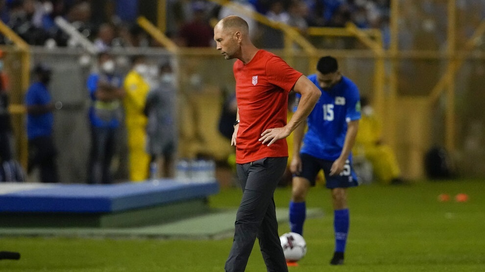 United States' coach Gregg Berhalter walks on the sideline during a qualifying soccer match.