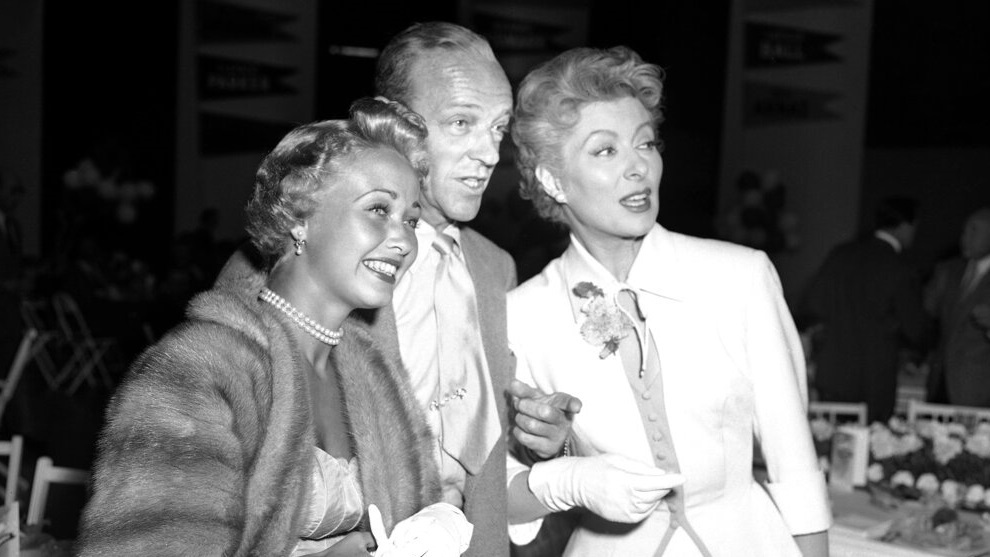 Jane Powell, left, Fred Astaire, center and Greer Garson pose for a photo in Los Angeles.