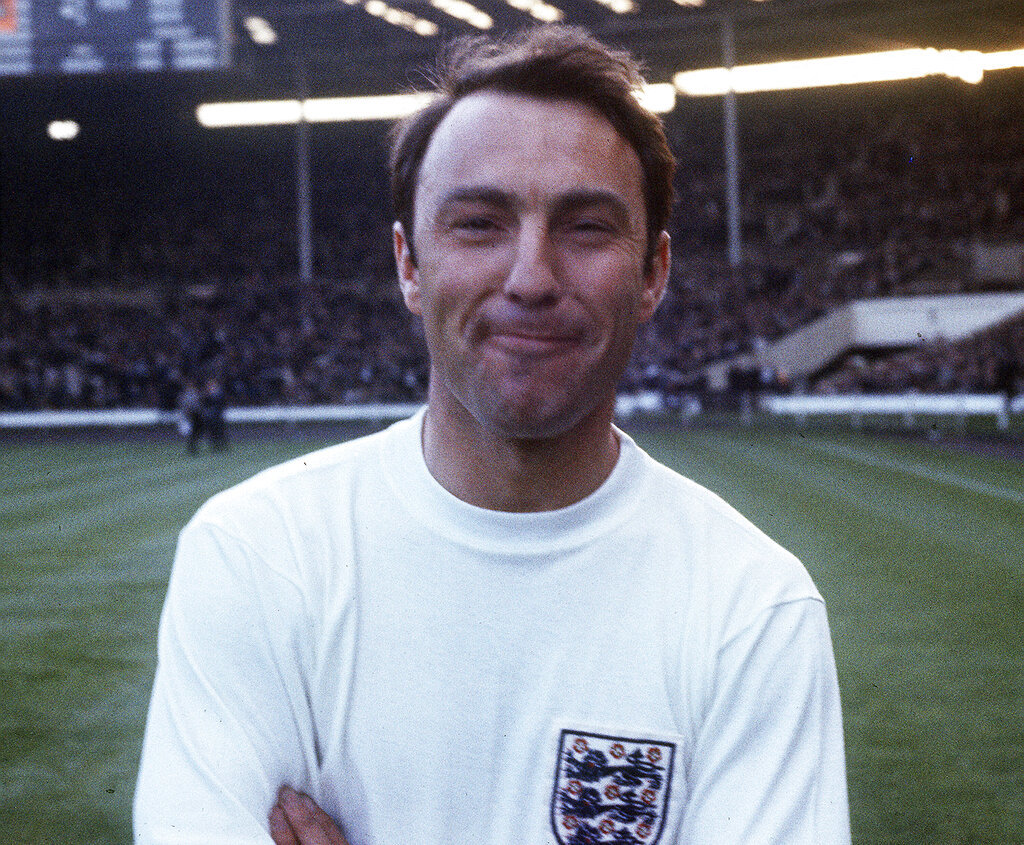 In this 1967 file photo, England football forward Jimmy Greaves stands on the pitch at Wembley.