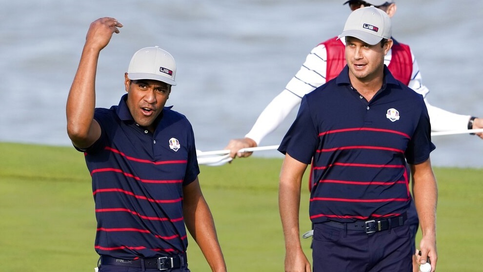 Tony Finau reacts after making a putt on the 13th hole during a four-ball match the Ryder Cup.