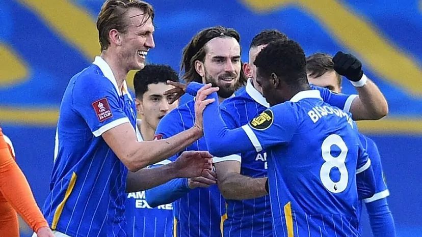 Bissouma celebrates a goal with his Brighton teammates
