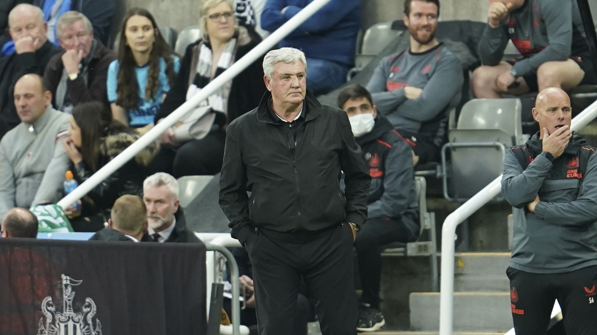 Steve Bruce watches the play during match between Newcastle and Spurs at St. James' Park.
