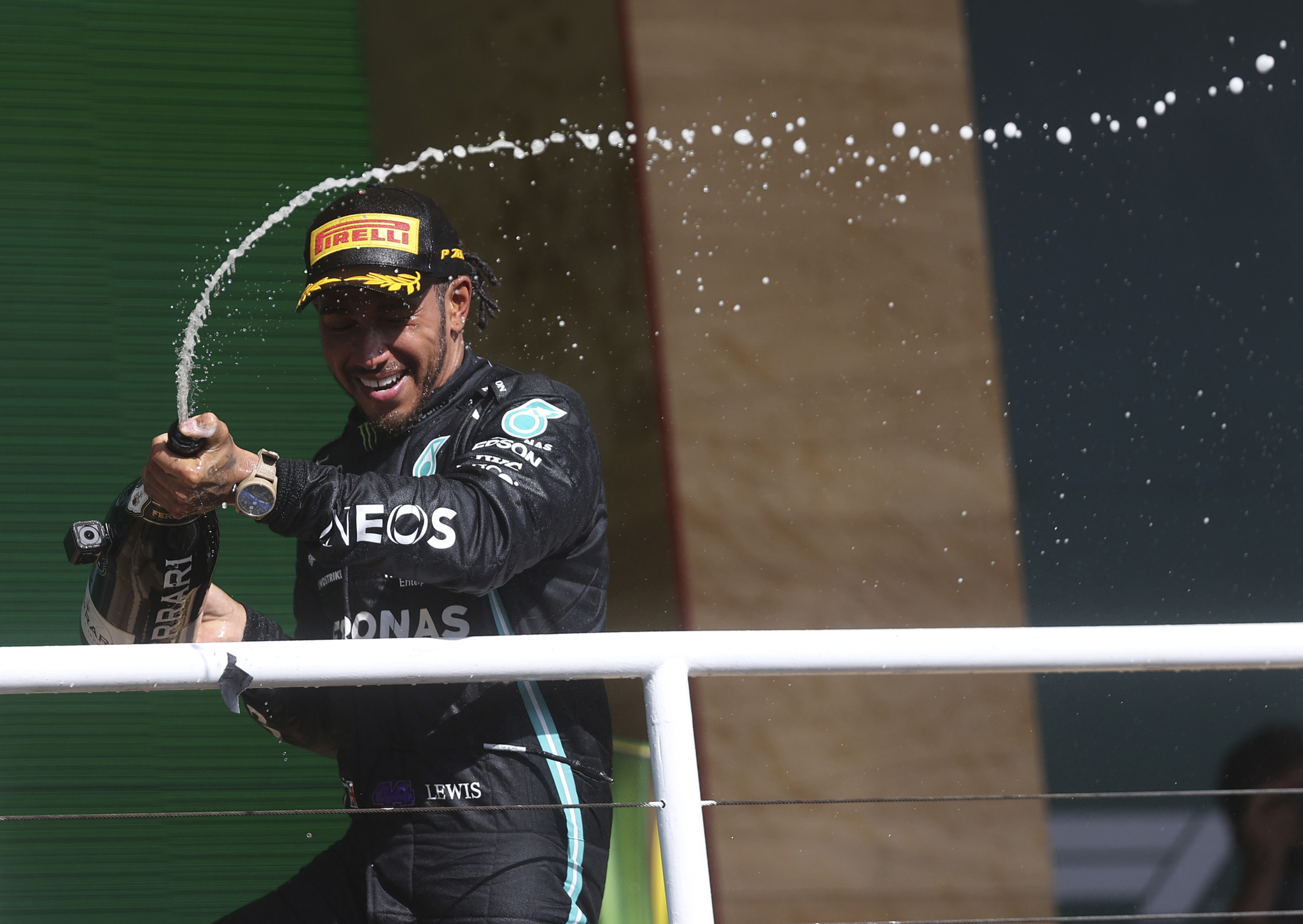 Mercedes driver Lewis lt;HIT gt;Hamilton lt;/HIT gt;, of Britain, celebrates his come from behind victory in the Brazilian Formula One Grand Prix in Sao Paulo, Brazil, Sunday, Nov. 14, 2021. (Lars Baron, Pool Photo via AP)