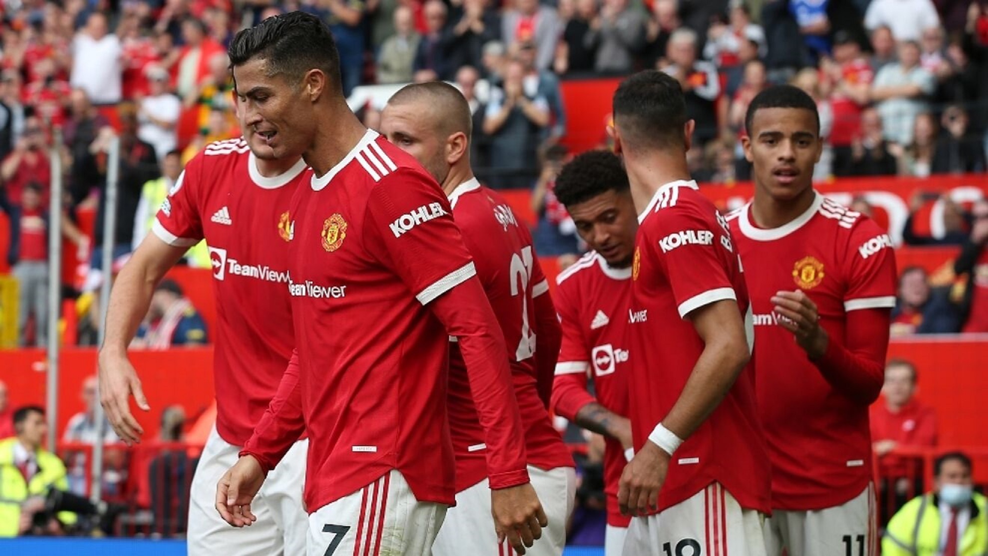Jugadores del Manchester United celebrando un gol en la Premier League.