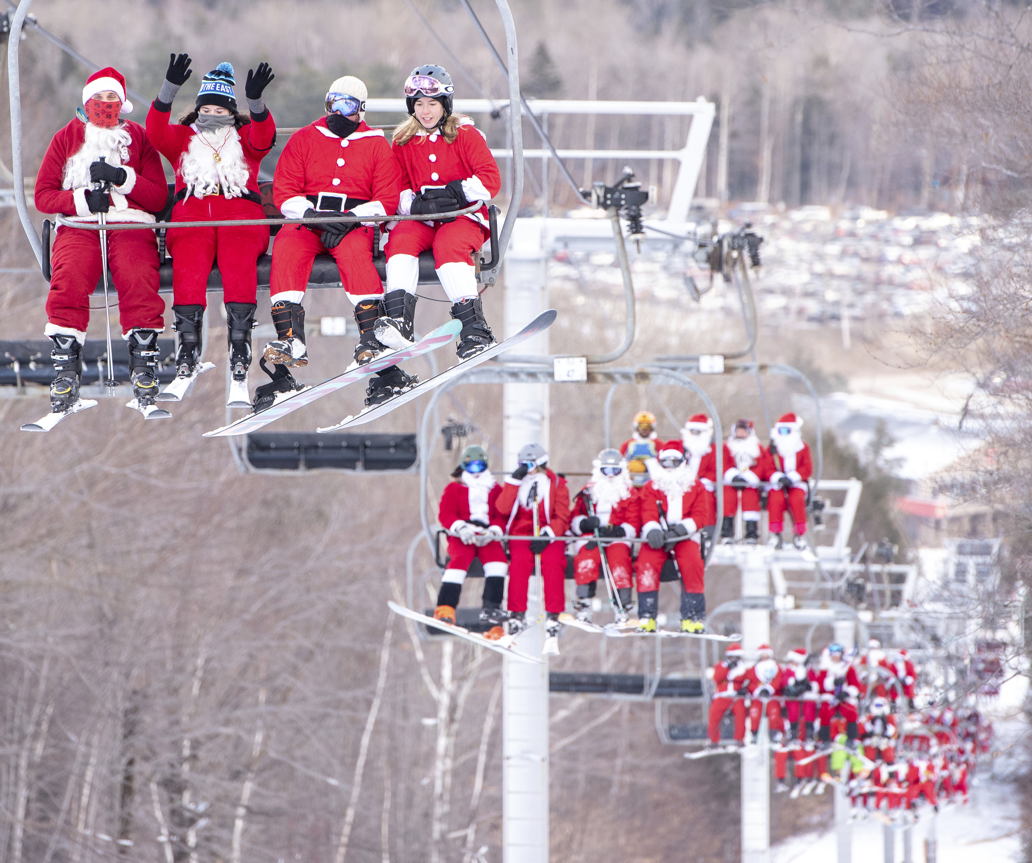 Skiers and snowboarders hit the slopes at Sunday River Ski Resort in Newry, Maine.