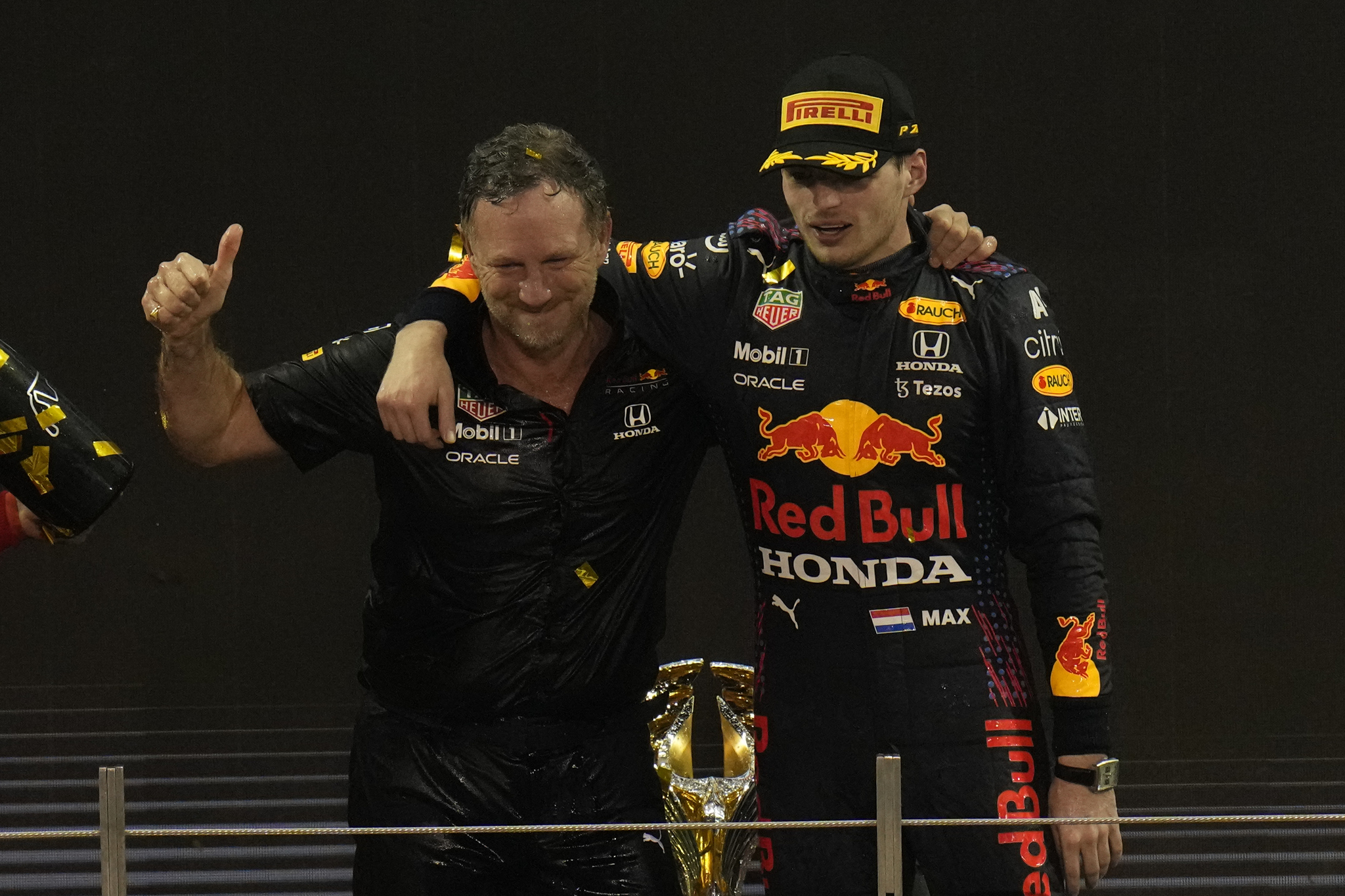 Red Bull team boss Christian Horner celebrates with Max Verstappen