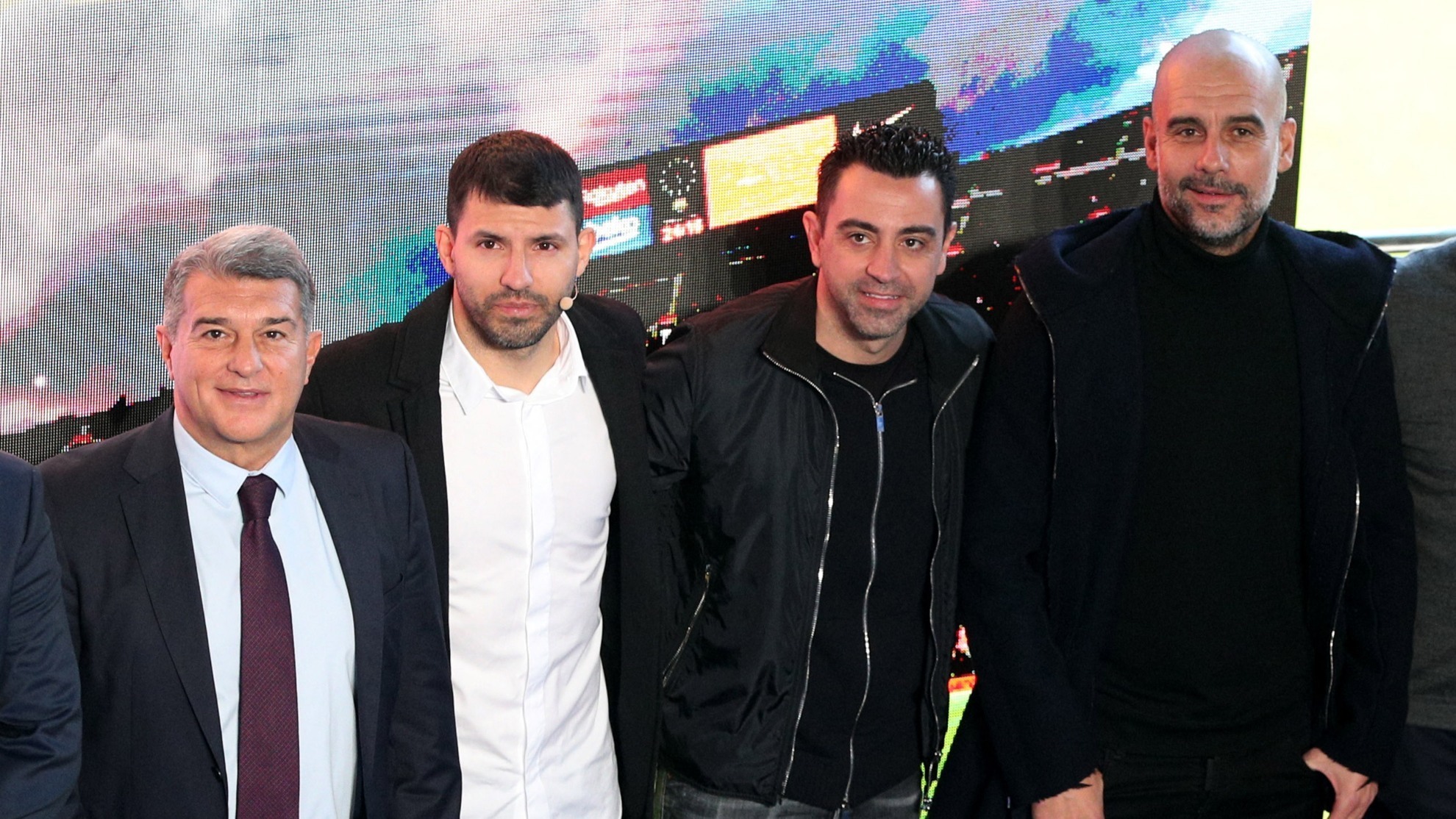 Laporta, Kun, Xavi y Guardiola en el anunció del argentino