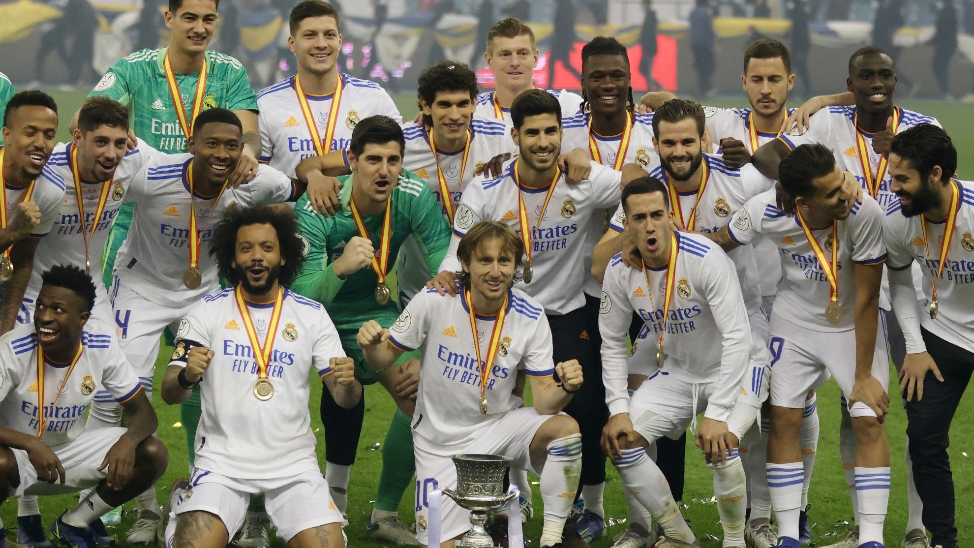 The Real Madrid players pose with the Supercopa de Espana trophy.