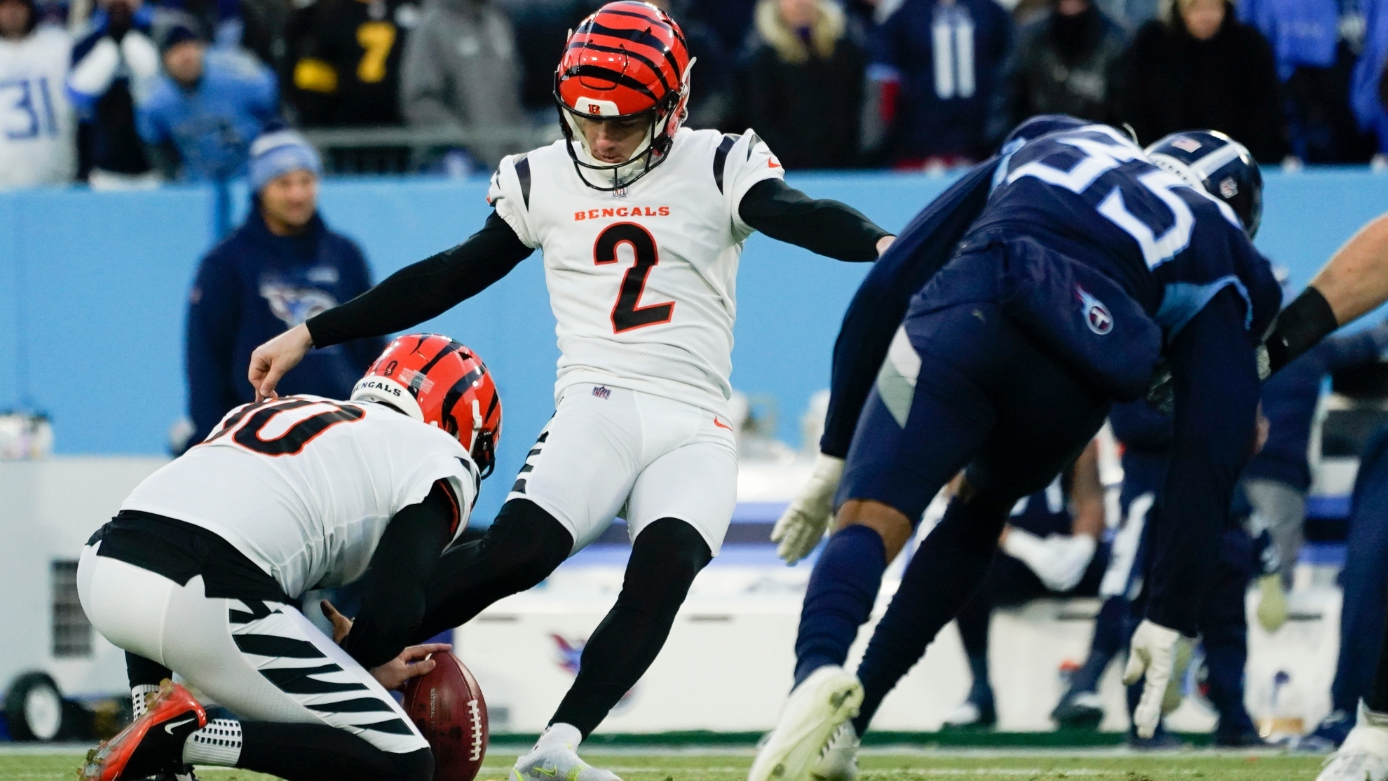 Cincinnati Bengals kicker Evan McPherson (2) kicks a 54-yard field goal against the Tennessee Titans during the first half of an NFL divisional round playoff football game, Saturday, Jan. 22, 2022