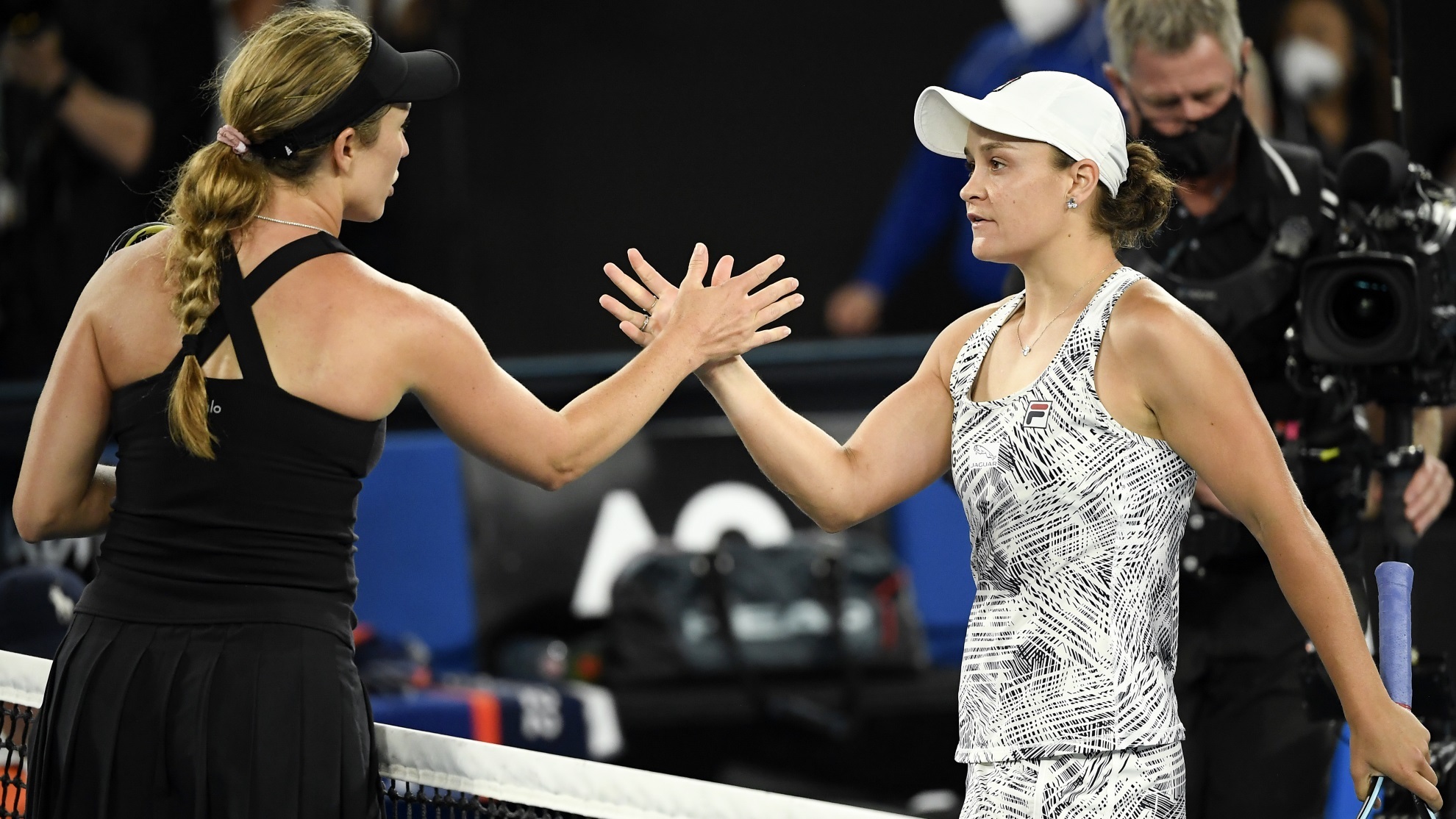 Ash Barty, right, of Australia is congratulated by Danielle Collins of the U.S.